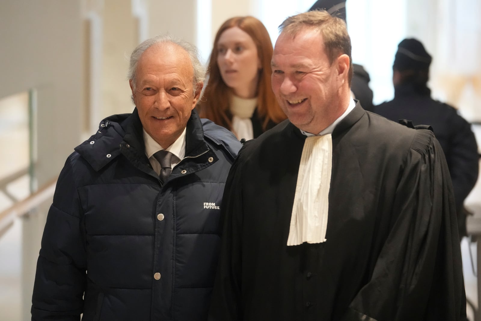 Thierry Gaubert, left, a former close adviser to former French President Nicolas Sarkozy arrives at the courtroom as Sarkozy goes on trial over alleged illegal financing of his 2007 presidential campaign by the government of late Libyan leader Moammar Gadhafi, Monday, Jan. 6, 2025 in Paris. (AP Photo/Thibault Camus)