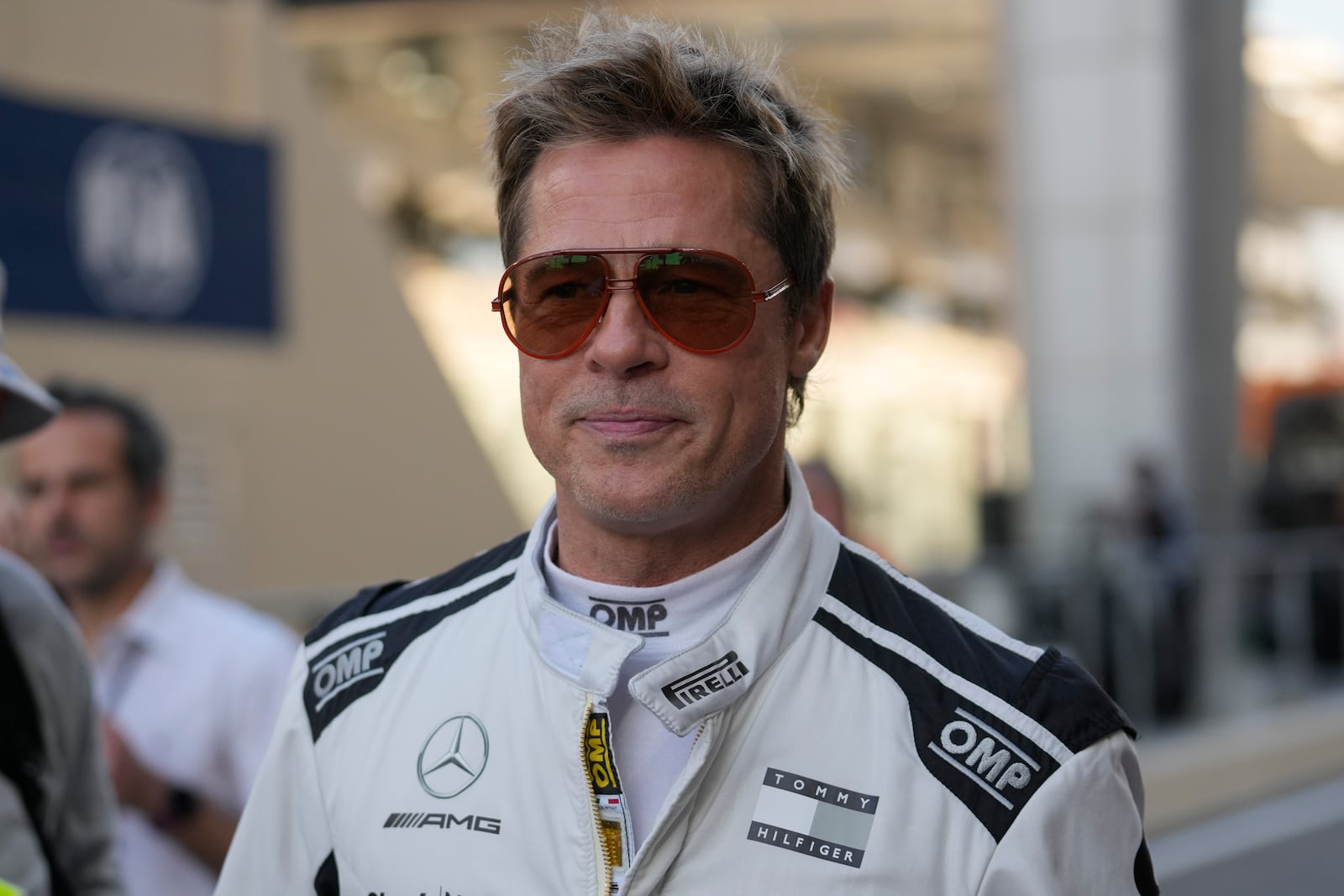 American actor Brad Pitt walks in the pit lane before the Formula One Abu Dhabi Grand Prix at the Yas Marina Circuit in Abu Dhabi, UAE, Sunday, Dec. 8, 2024. (AP Photo/Darko Bandic)