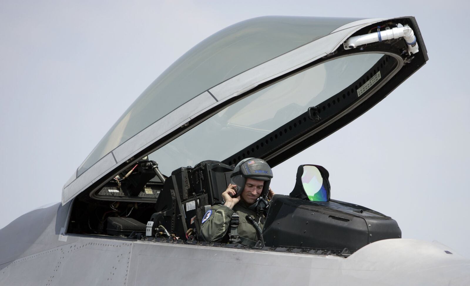 An F-22 Raptor demonstration pilot in the cockpit of the stealh figther before flying in the Vectren Dayton Air Show in 2008. TY GREENLEES/STAFF FILE PHOTO