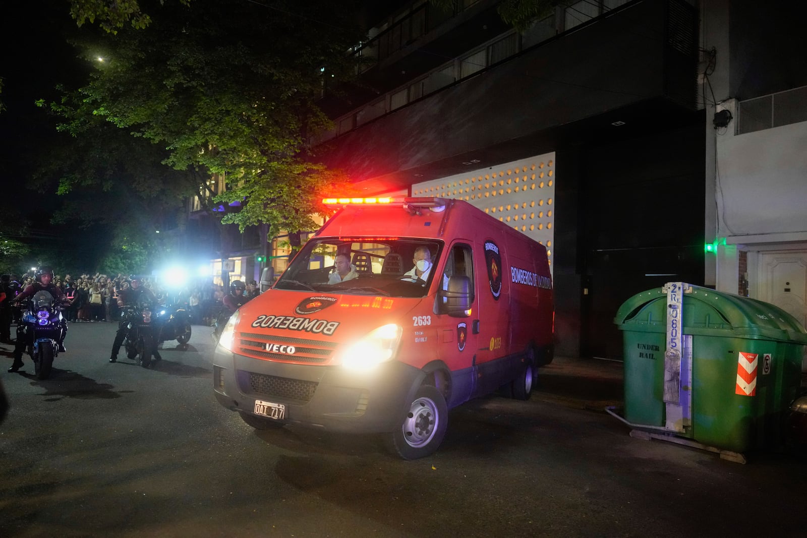 An ambulance carrying the body former One Direction singer Liam Payne leaves the hotel where he was found dead after falling from a balcony in Buenos Aires, Argentina, Wednesday, Oct. 16, 2024. (AP Photo/Natacha Pisarenko)