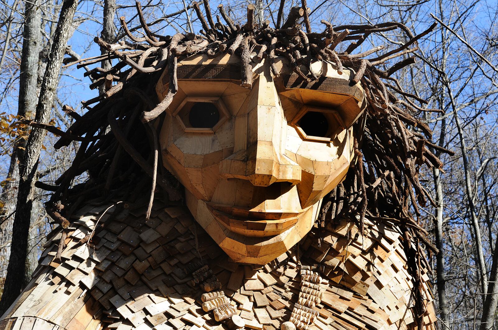 Bo, the father in the family of trolls installation at Aullwood Audubon Center and Farm, sits in the woods. "The Troll That Hatched an Egg" is by Artist Thomas Dambo is one of only nine Dambo-created exhibitions in the United States and Puerto Rico. MARSHALL GORBY\STAFF