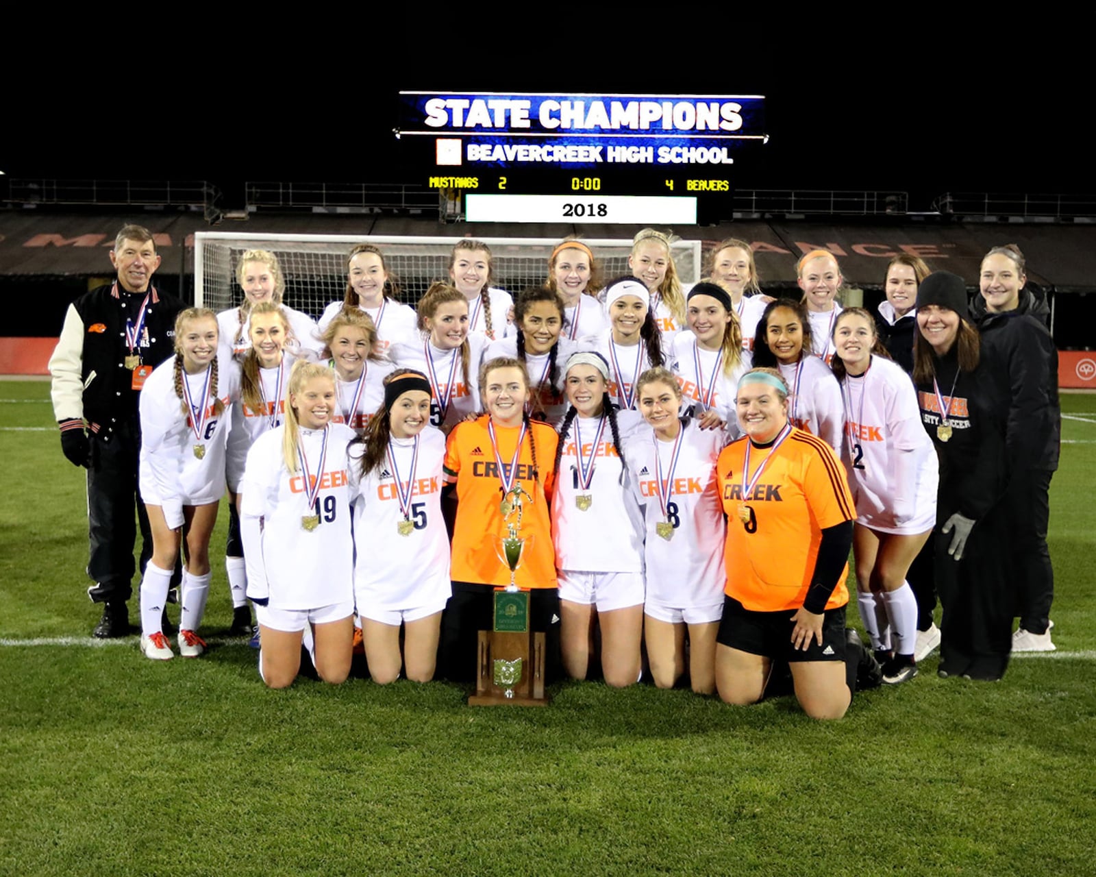 Steve Popp (top row left) with the 2018 state champion Beavercreek girls soccer team, which finished 24-0. CONTRIBUTED