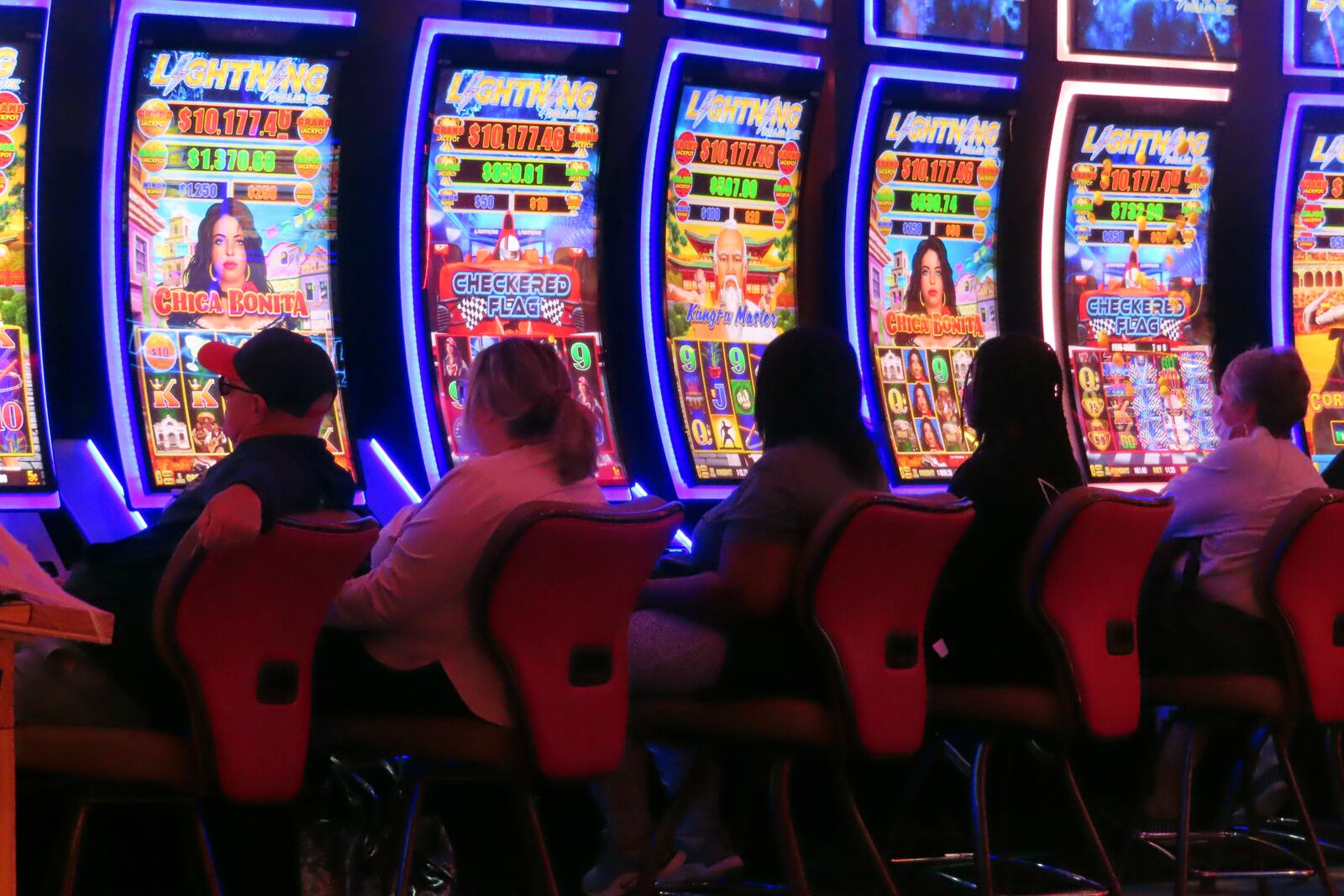 Gamblers play slot machines at the Hard Rock casino in Atlantic City, N.J., on Oct. 3, 2024. (AP Photo/Wayne Parry)