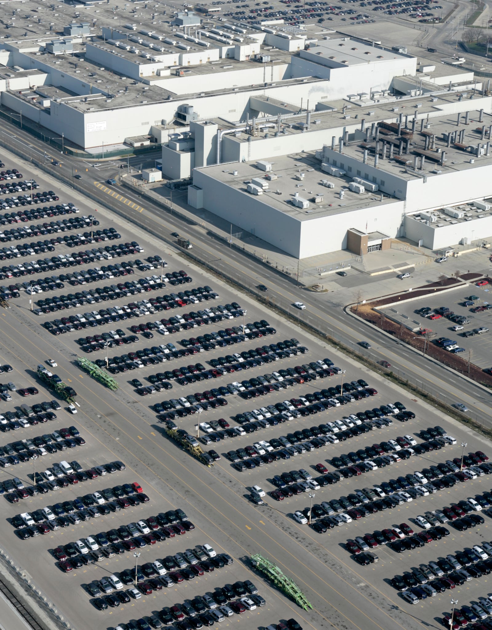 11-21-05 -- Sport Utility Vehicles fill the parking lots surrounding the General Motors Moraine Assembly Plant in Moraine, Ohio. GM announced on Monday that it will close nine plants as part of a major North American restructuring. The third shift at the Moraines Assembly Plant will be eliminated some time next year. Photo by Ty Greenlees/Newschopper 7