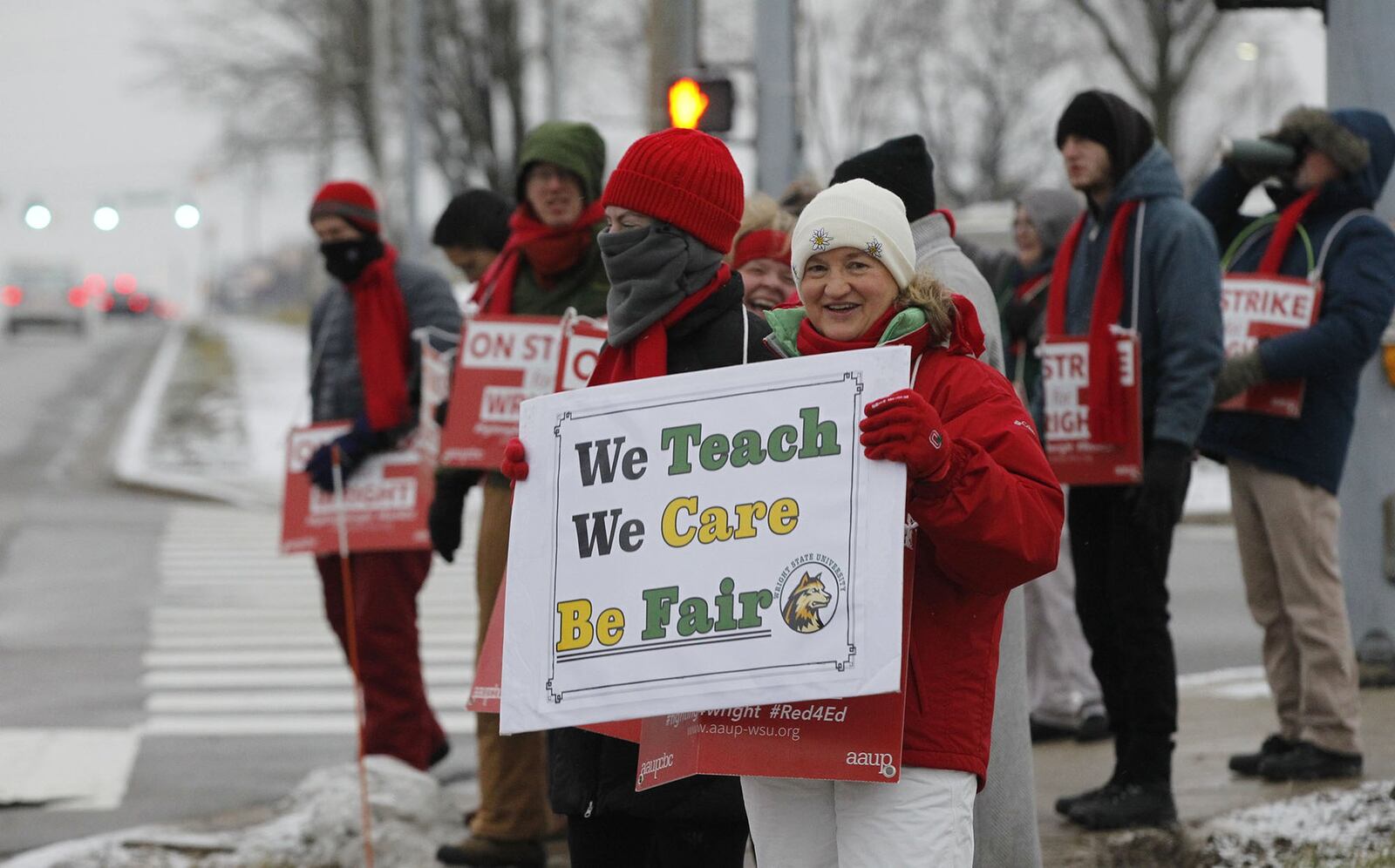 Striking members of Wright State University’s faculty union continued to picket on Thursday, the third day of the strike. Most classes continued to operate with some consolidated, some taught by substitutes, and others taught online. TY GREENLEES / STAFF