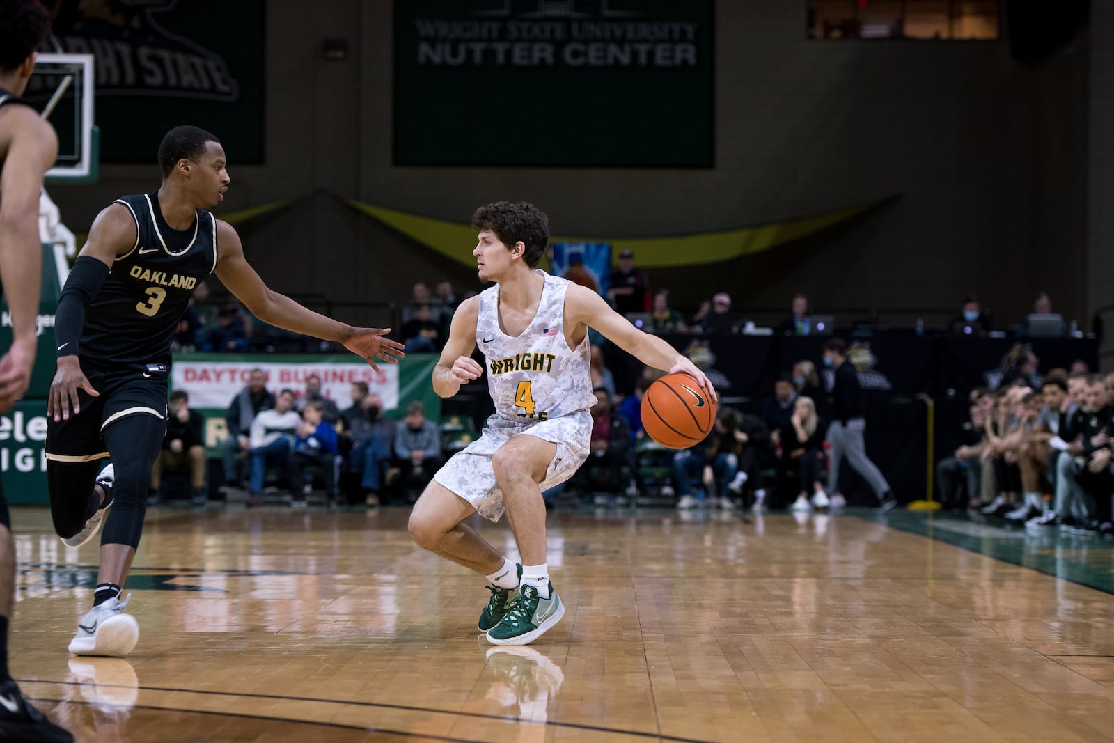 Wright State's Keaton Norris is defended by Oakland's Micah Parrish during a game at the Nutter Center on Feb. 5, 2022. Joseph Craven/Wright State Athletics