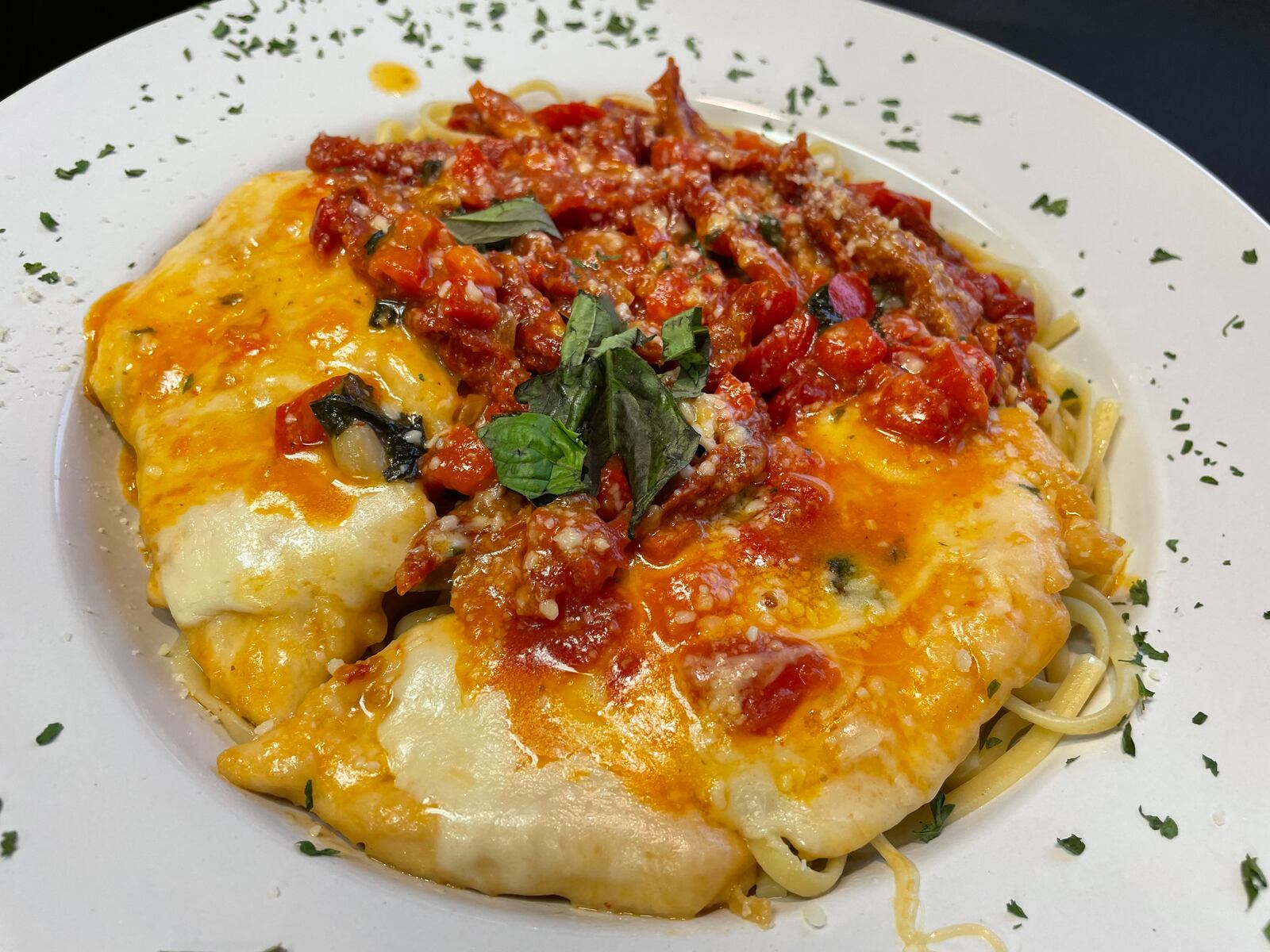 Jimmy’s Italian Cuisine & Bar is opening its doors in downtown Dayton at 824 E. Fifth St. on Wednesday, May 1. Pictured is the Chicken Salerno. NATALIE JONES/STAFF