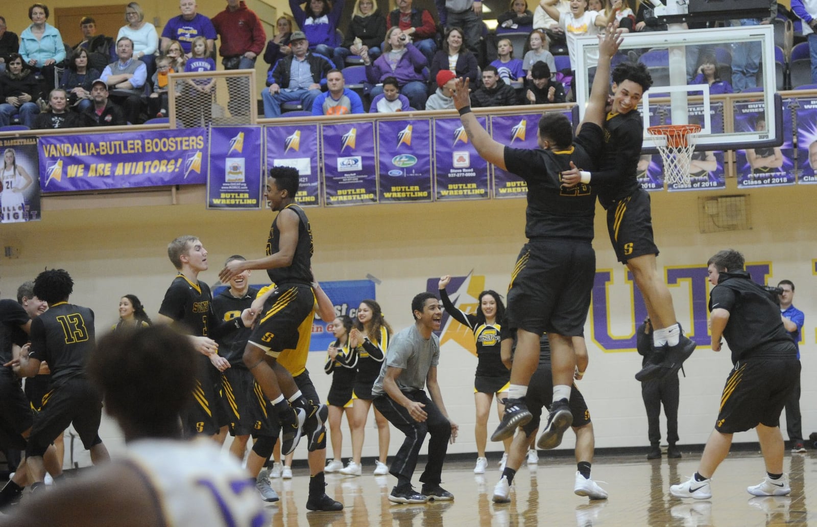 Andre Gordon of Sidney (highest, right) transfered back to Sidney from Huntington Prep (W.Va.) for his senior year. MARC PENDLETON / STAFF