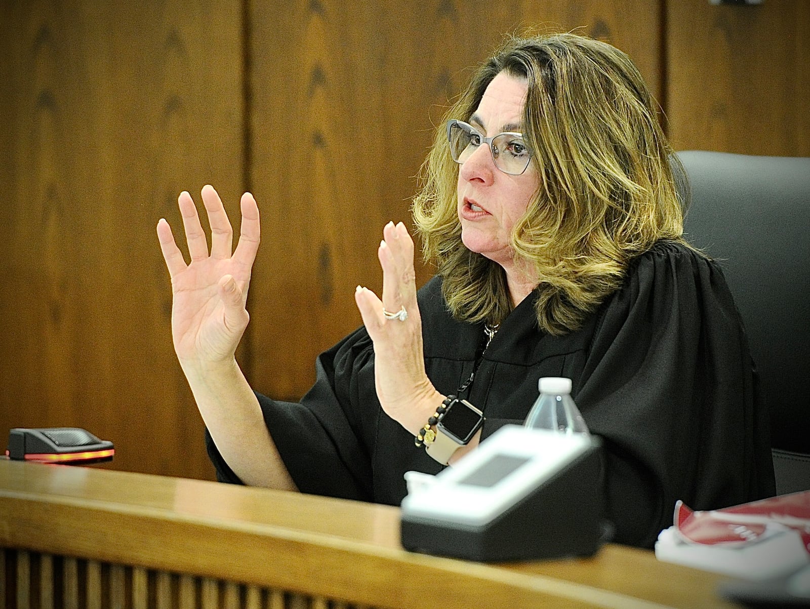 Judge Stacy M. Wall talks Wednesday March 29, 2023 with attorneys about the demolition of 112-118 West Main St. buildings in Troy on Main Street. MARSHALL GORBY\STAFF