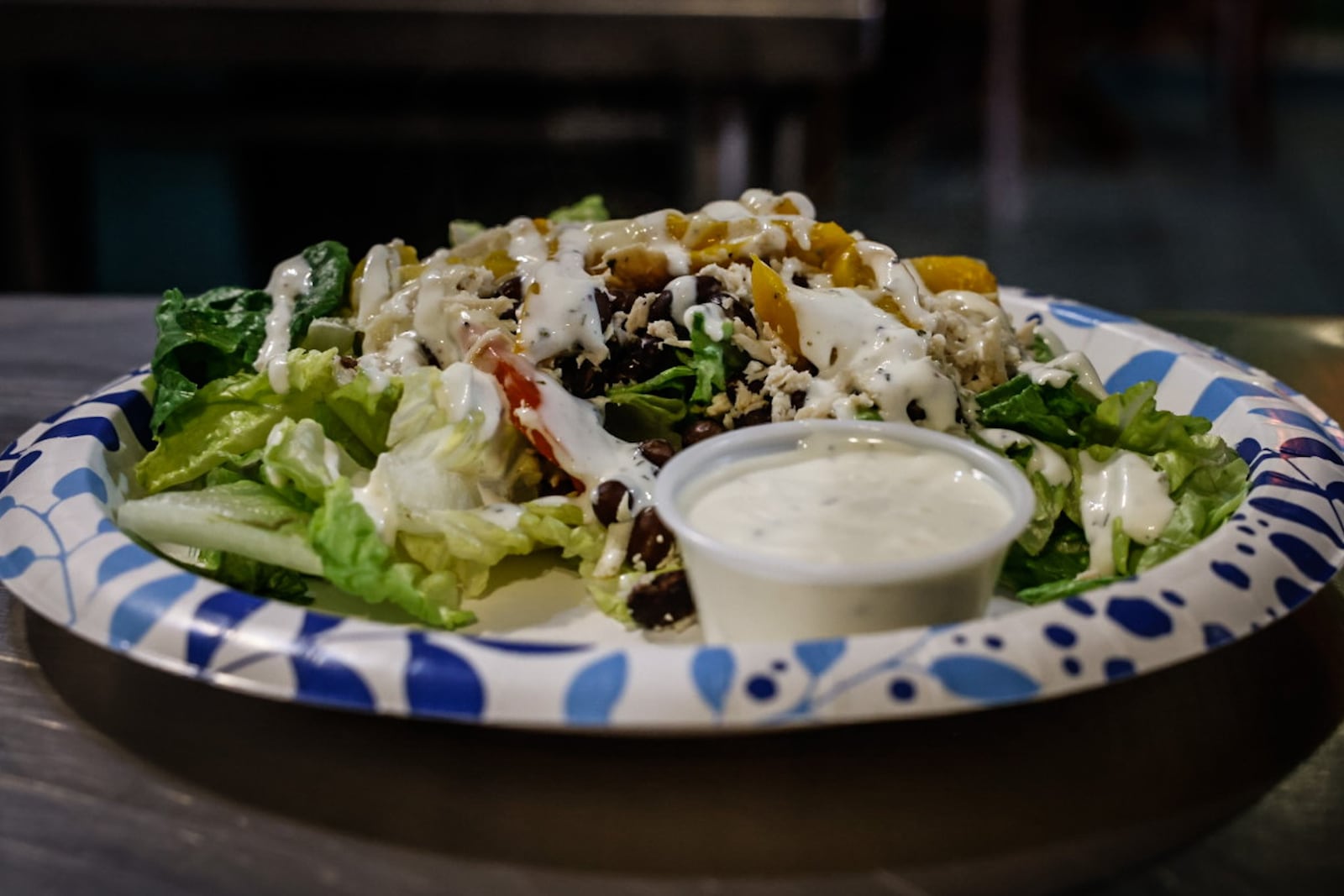 Chicken fajita salad is made fresh at Flavors Eatery in Centerville. JIM NOELKER/STAFF