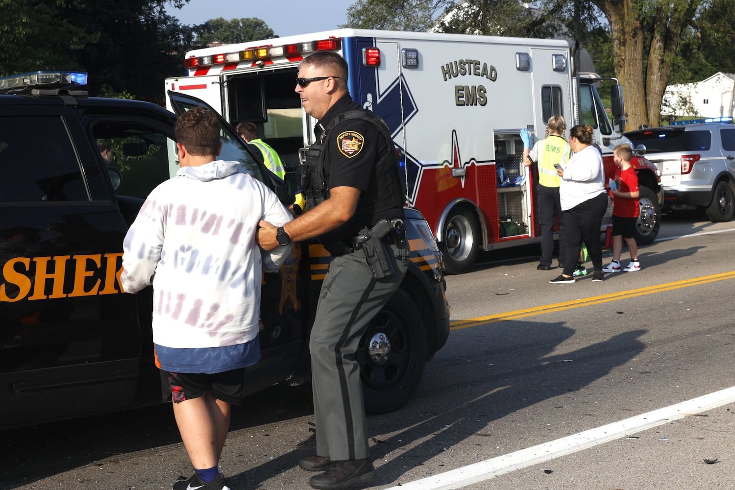 One killed after Northwestern school bus overturns in crash