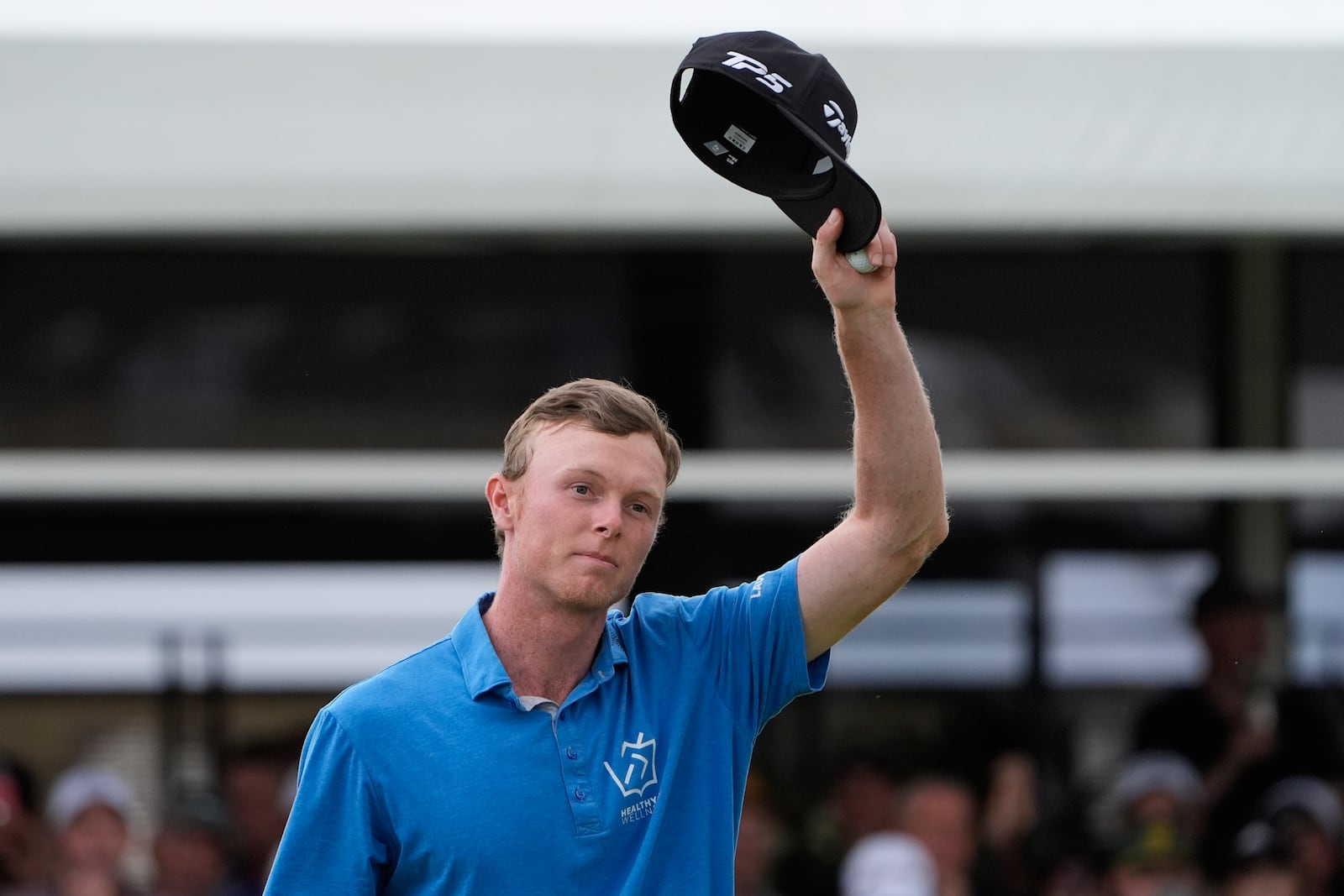 Ryggs Johnston of the United States reacts after winning the Australian Open golf championship at the Kingston Heath Golf Club in Melbourne, Australia, Sunday, Dec. 1, 2024. (AP Photo/Asanka Brendon Ratnayake)