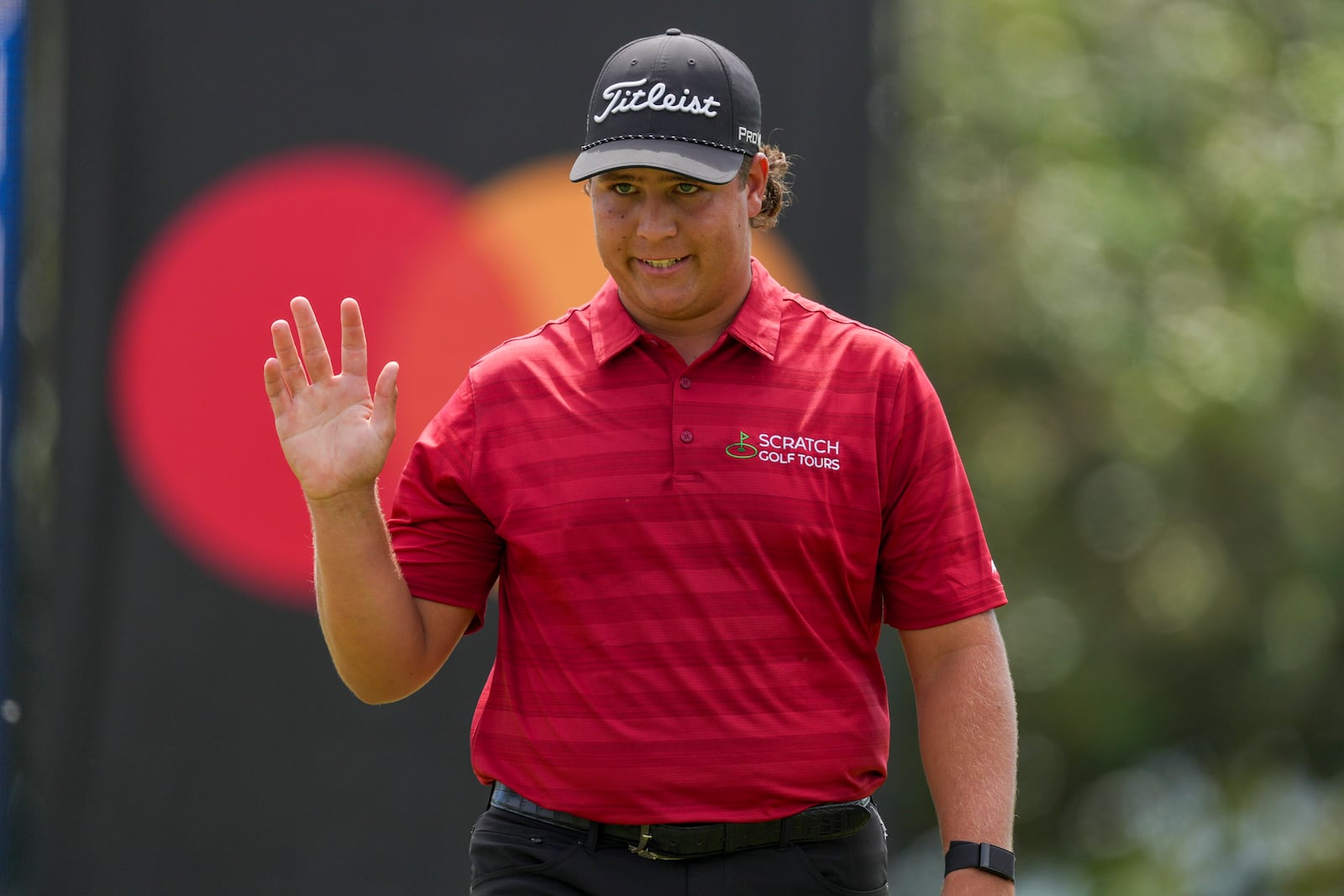 Aldrich Potgieter, of South Africa, reacts to making a birdie on the 13th hole during the second round of the Mexico Open golf tournament in Puerto Vallarta, Mexico, Friday, Feb. 21, 2025. (AP Photo/Fernando Llano)