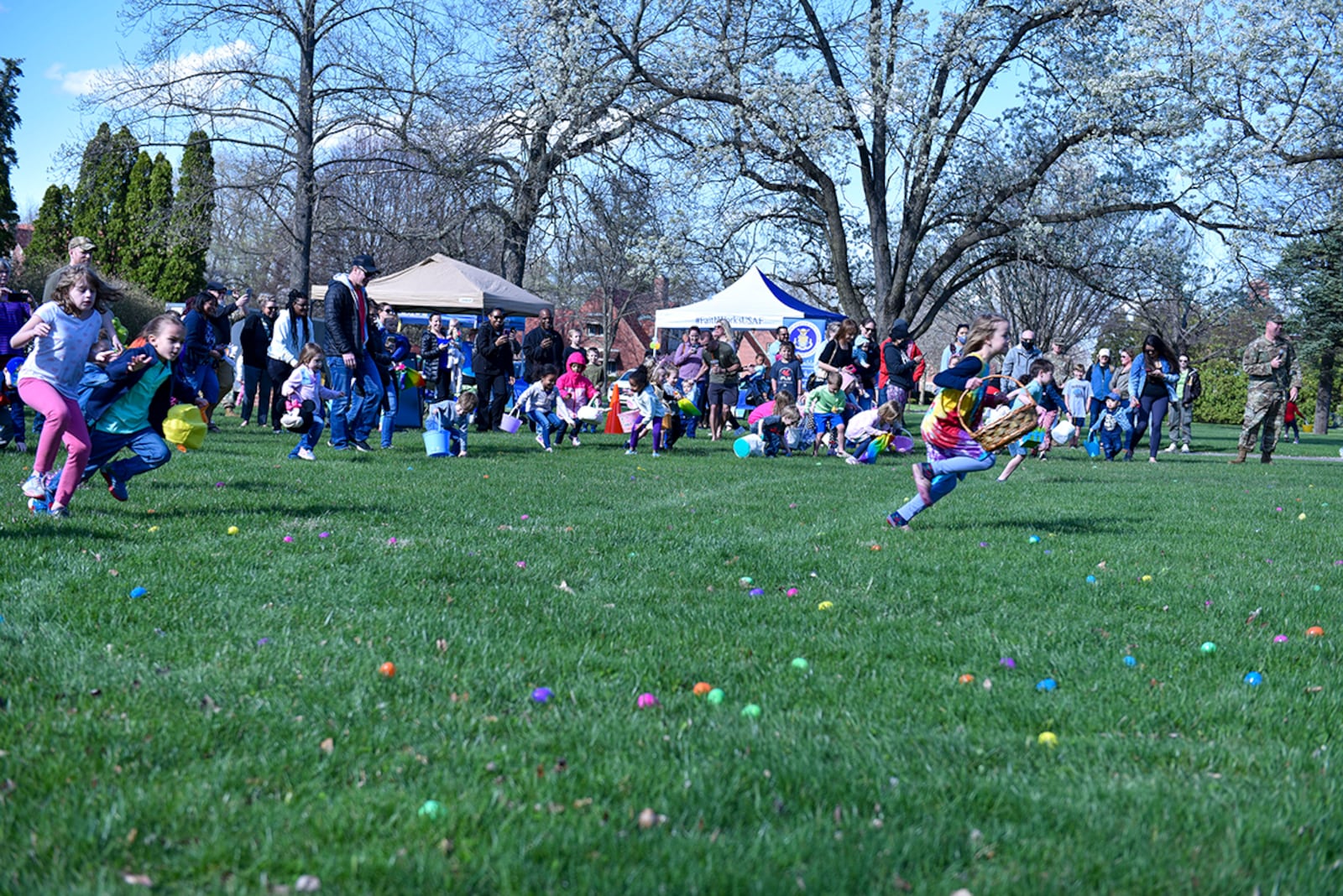 Young children participate in an Easter egg hunt at Turtle Pond on Wright-Patterson Air Force Base April 15. U.S. AIR FORCE PHOTO/SENIOR AIRMAN JACK GARDNER