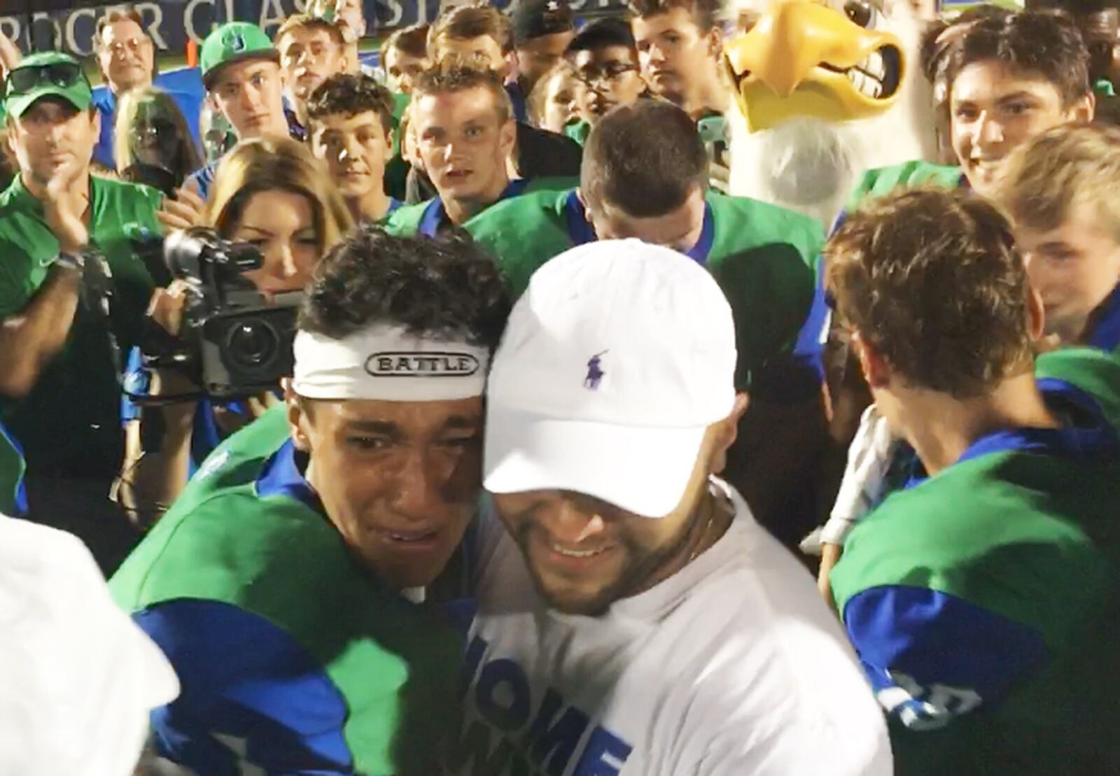 CJ quarterback Ryan Minor (left) celebrated a 58-16 Week 3 defeat of visiting Greenville with a surprise visit from his father, Chris Minor, a captain who’s deployed at Turkey with the U.S. Air Force. MARC PENDLETON / STAFF