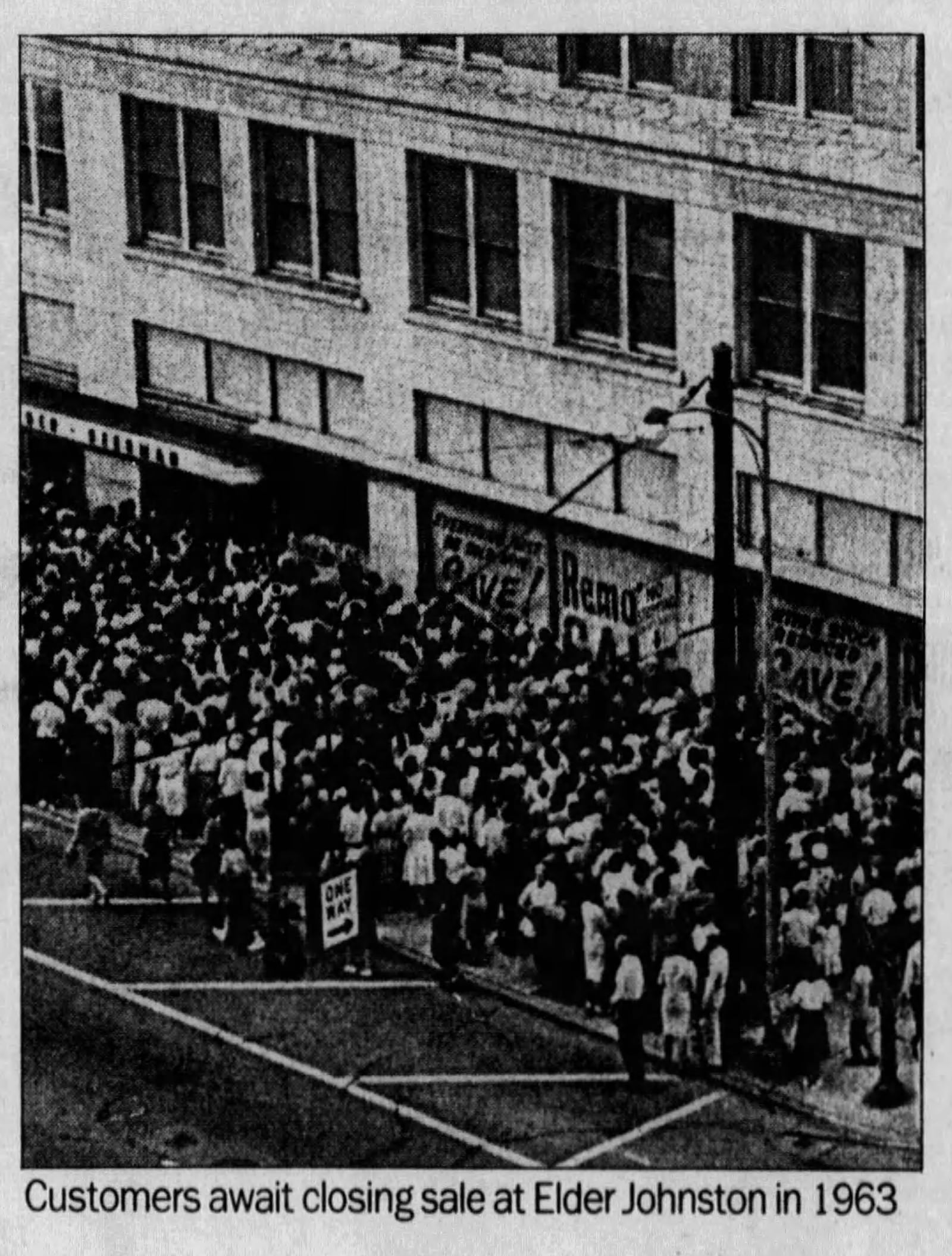 Customers await the closing sale at Elder Johnston in 1963. DAYTON DAILY NEWS ARCHIVES.