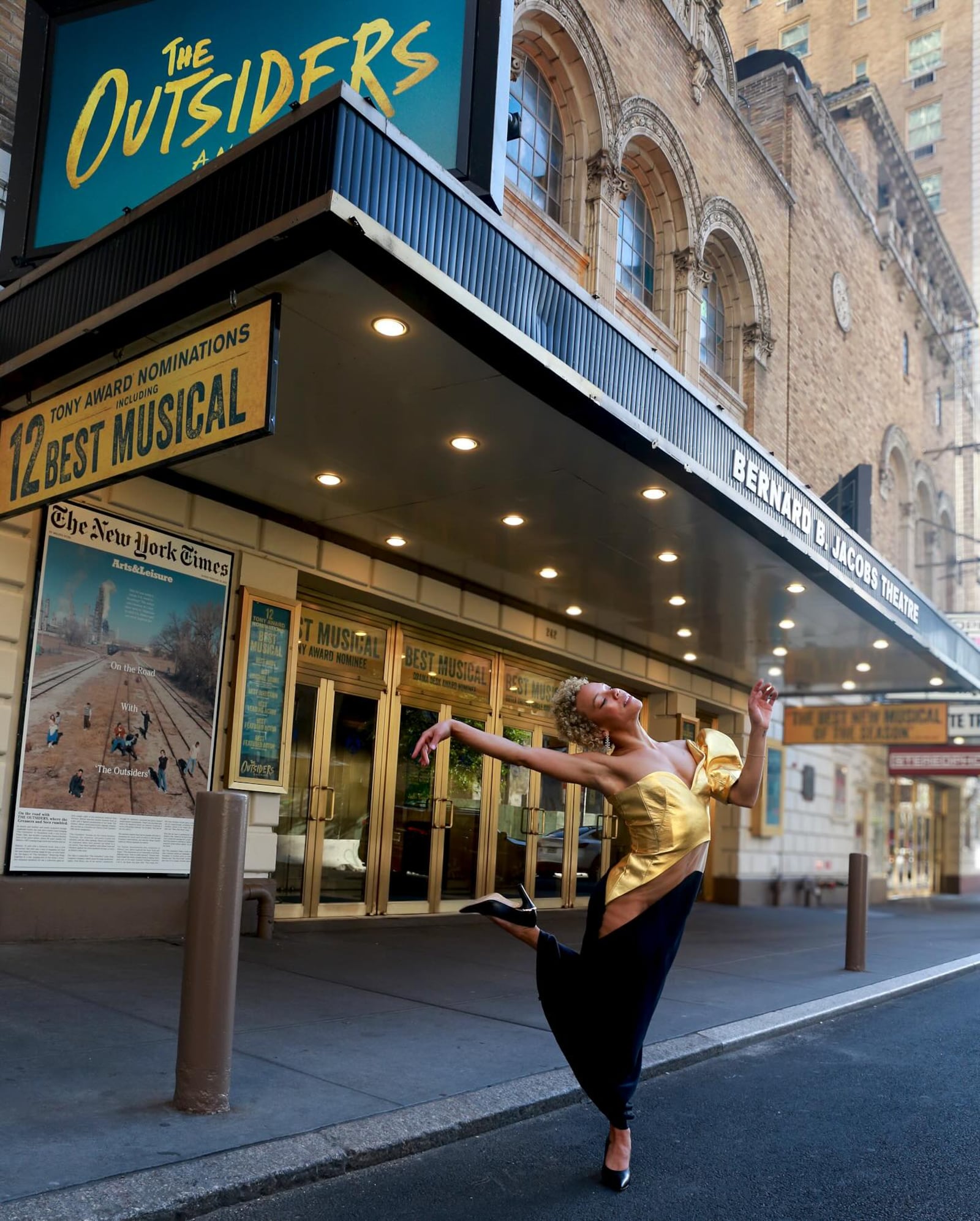 Wright State University dance alumna Tilly Evans-Krueger outside New York's Bernard B. Jacobs Theatre, the home of the Tony-winning musical "The Outsiders." PHOTO BY @KAMERASHOOTSNYC (KATIE MOLLISON)