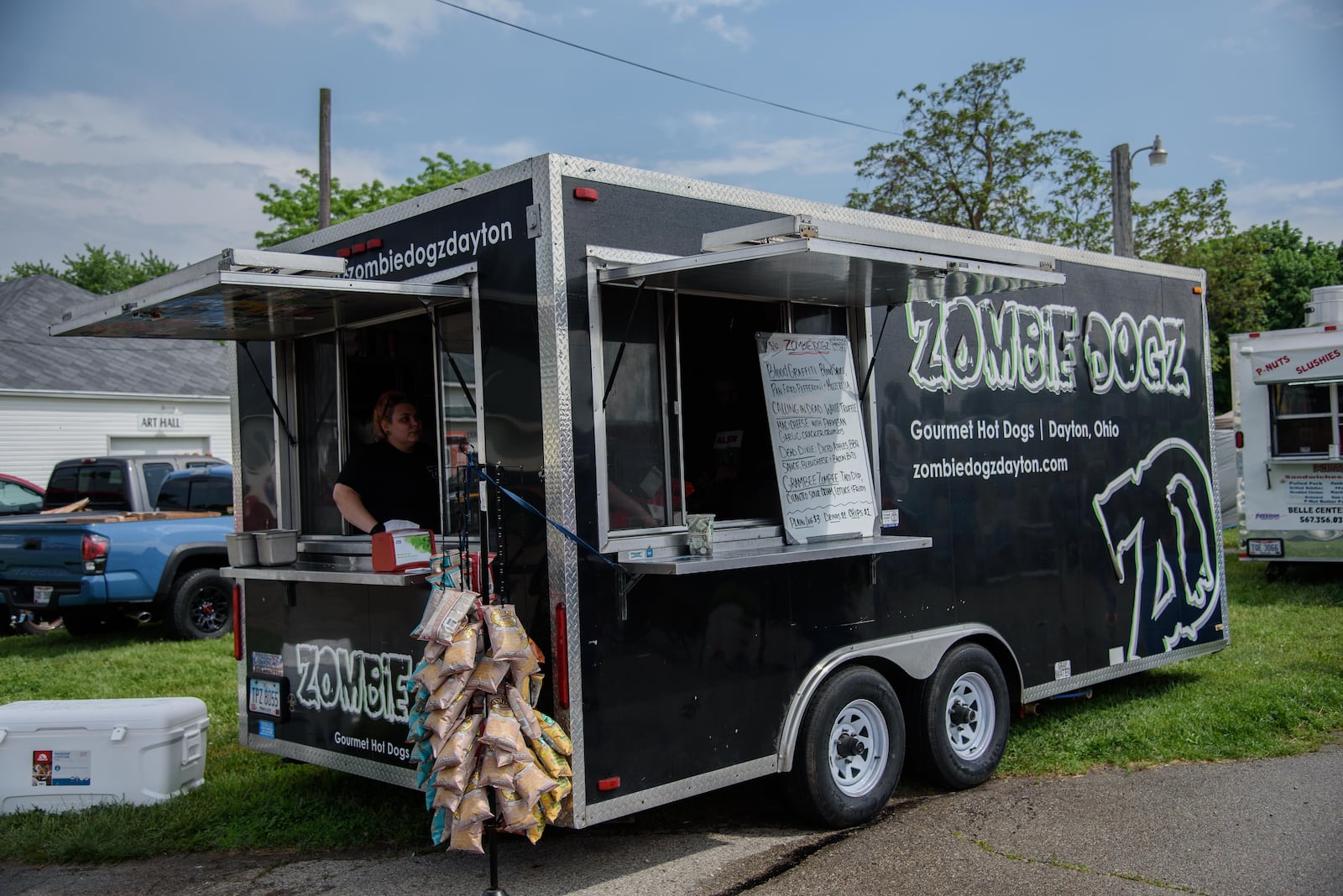 More than 50 trucks participated in this year's Miami County Gourmet Food Truck Rally, including Zombie Dogz. One of their specialties is a pizza-inspired dog called the Blood Graffiti. PHOTO / TOM GILLIAM PHOTOGRAPHY