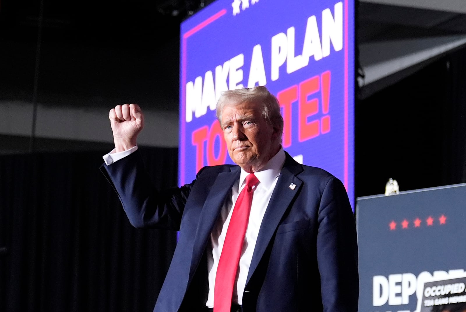 Republican presidential nominee former President Donald Trump gestures at a campaign rally at the Gaylord Rockies Resort & Convention Center, Friday, Oct. 11, 2024, in Aurora, Colo. (AP Photo/Alex Brandon)