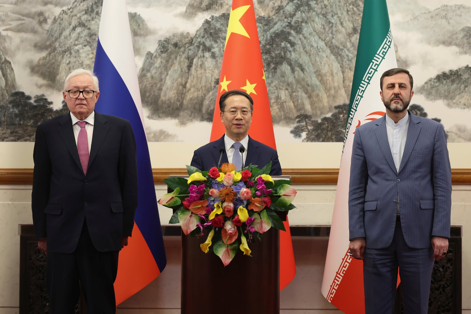 From left, Russian Deputy Foreign Minister Sergei Ryabkov, Chinese Vice Foreign Minister Ma Zhaoxu and Iranian Deputy Foreign Minister Kazem Gharibabadi, meet with reporters after their meeting at Diaoyutai State Guest House on March 14, 2025 in Beijing, China. (Lintao Zhang/Pool Photo via AP)