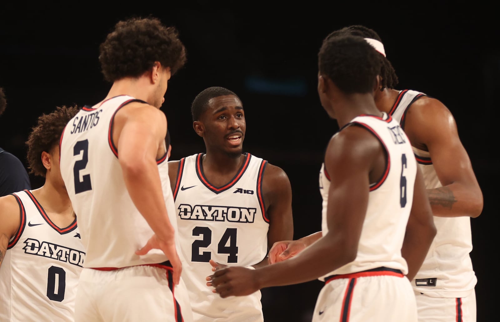 Dayton's Kobe Elvis talks to teammates during a game against Duquesne in the Atlantic 10 Conference tournament quarterfinals on Thursday, March 14, 2024, at the Barclays Center in Brooklyn, N.Y. David Jablonski/Staff