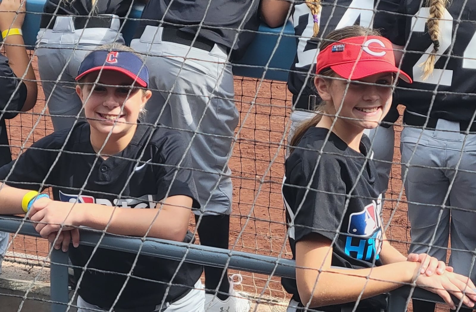 Piper Wade, left, of Beavercreek, and Madison Smith, of Springboro, pose for a photo at Dodger Stadium in Los Angeles on Oct. 27 during Major League Baseball's Pitch, Hit & Run competition. Photo by Sean Wade