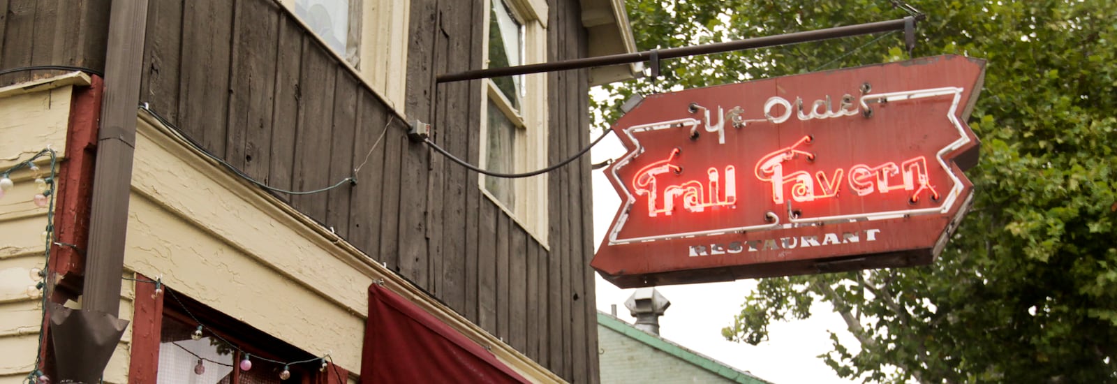 A log cabin built in 1827, Ye Olde Trail Tavern on Xenia Avenue is the oldest building in Yellow Springs and is believed to be the second oldest existing tavern in Ohio. Staff photo by Jim Witmer