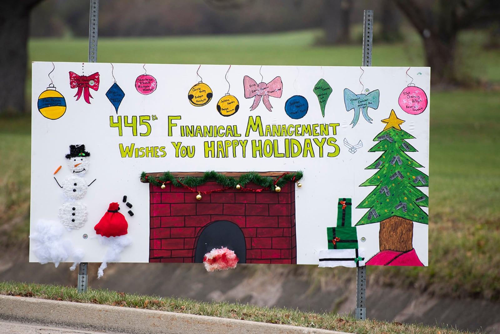 Giant Christmas cards designed by base organizations line Skeel Avenue on Wright-Patterson Air Force Base. The cards are an attempt to keep people socially connected during COVID-19 restrictions. U.S. AIR FORCE PHOTOS/WESLEY FARNSWORTH