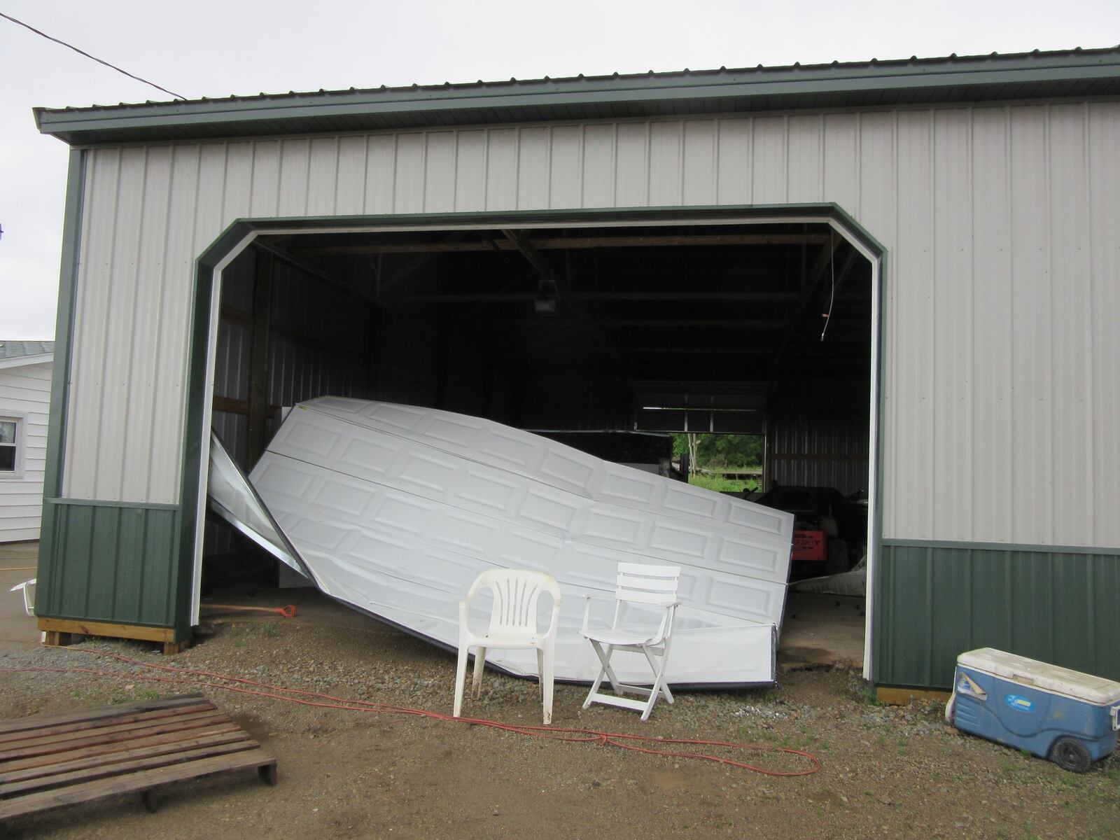 This farm owned by James and Mary Ann Barr at 1045 Ludlow Road in Beavercreek Township was hit by last Monday’s tornado and also by a tornado on April 3, 2018. The latest tornado tore off their home’s roof and damaged two other buildings, including this one that replaced one of two that were badly damaged in the 2018 tornado. PHOTOS by Lynn Hulsey