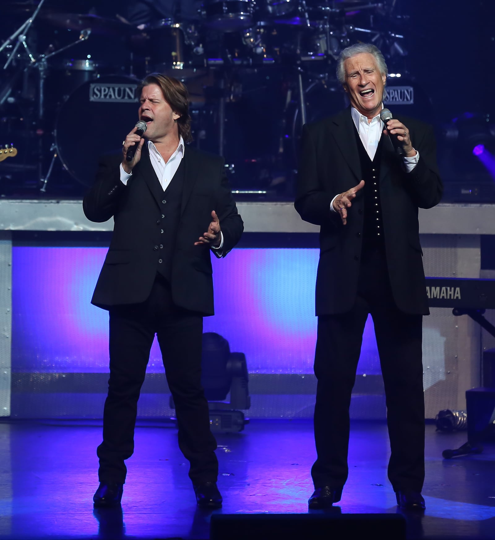 Founding member Bill Medley (right) and newer addition Bucky Heard of the Righteous Brothers share a double bill with the Temptations at Rose Music Center in Huber Heights on Saturday, June 25.