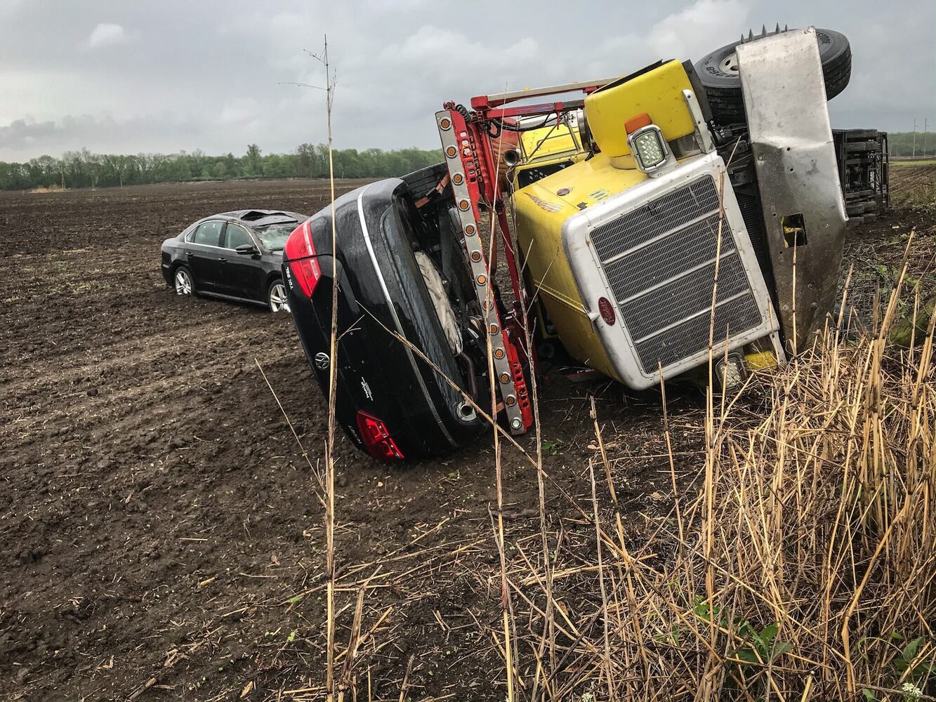 Truck hauling VWs overturns on I-70 West in Clark County