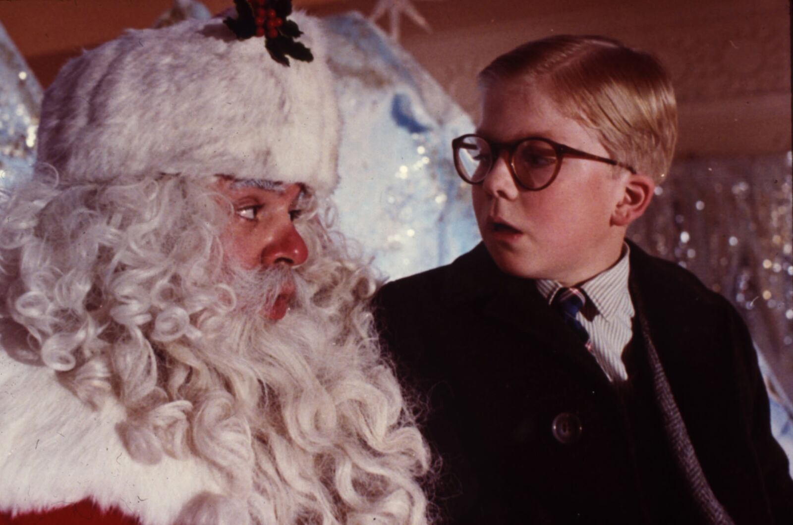 Ralphie (Peter Billingsley) visits a department store Santa (Jeff Gillen) as part of his campaign to find a BB gun under his tree in the classic holiday film “A Christmas Story.” The film will be screened today as the last offering in the Krog Holiday Week movie series. CONTRIBUTED: MGM