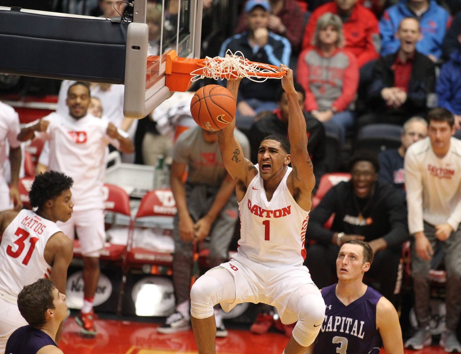 Dayton’s Obi Toppin dunks against Capital in an exhibition game on Friday, Nov. 2, 2018, at UD Arena. David Jablonski/Staff