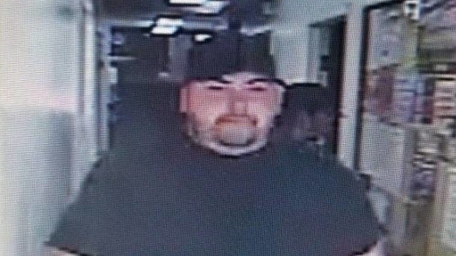 Bank surveillance cameras show Heath Edward Bumpous leaving a Texas bank Friday morning. Deputies said Bumpous confessed to robbing the Citizens State Bank.