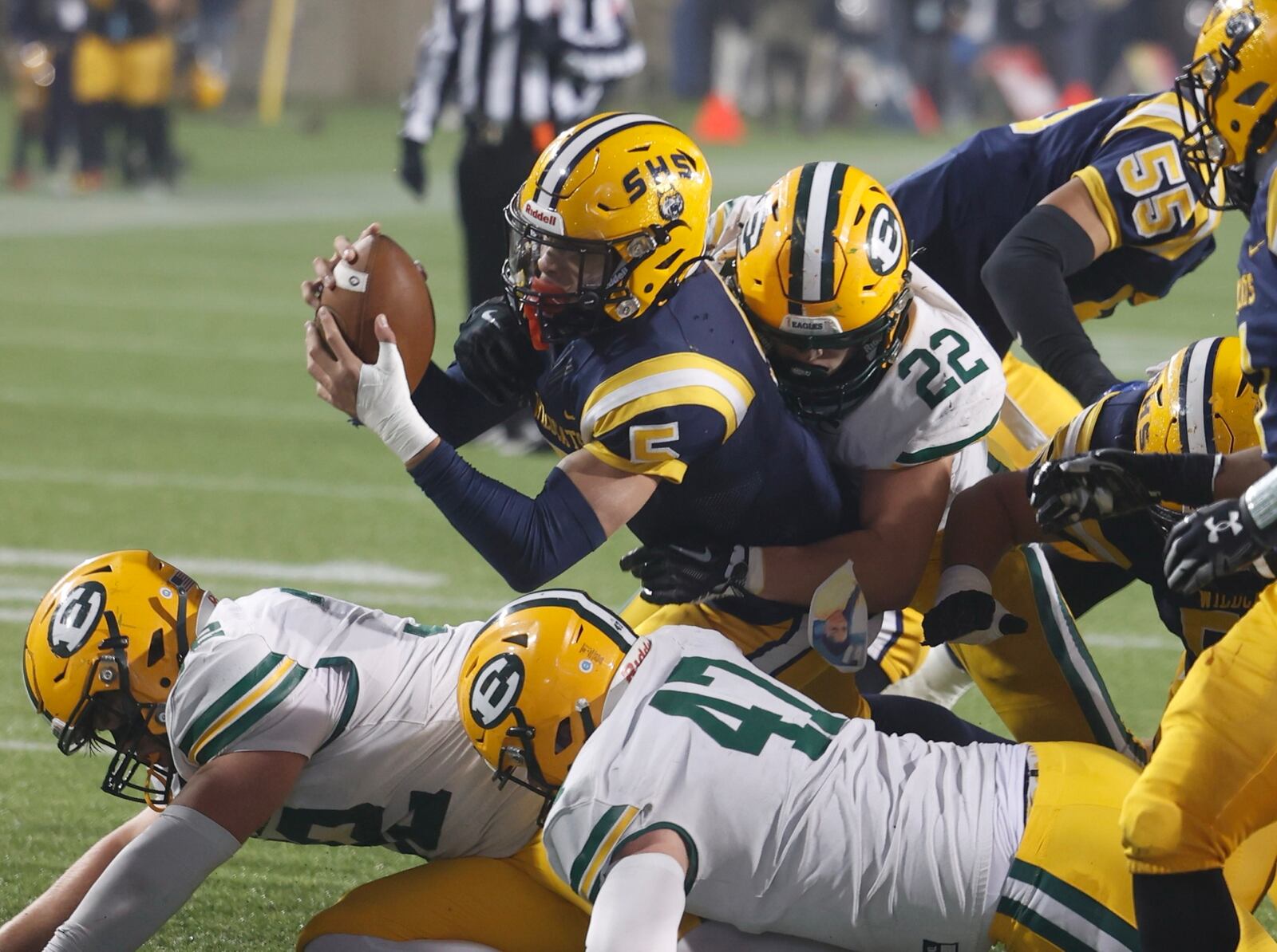 Aaron Scott dives for the goal line against StEds during a their state championship game Friday, Dec. 1, 2023. BILL LACKEY/