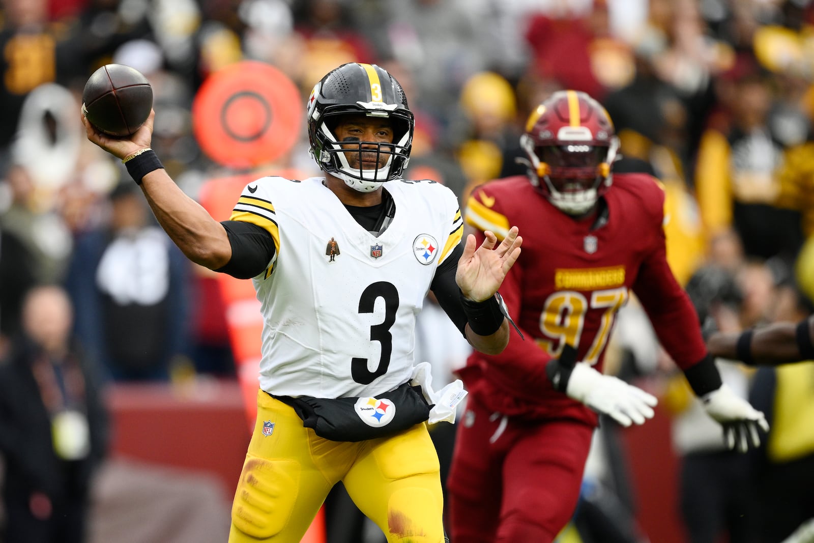 Pittsburgh Steelers quarterback Russell Wilson throws during the first half of an NFL football game against the Washington Commanders, Sunday, Nov. 10, 2024, in Landover, Md. (AP Photo/Nick Wass)