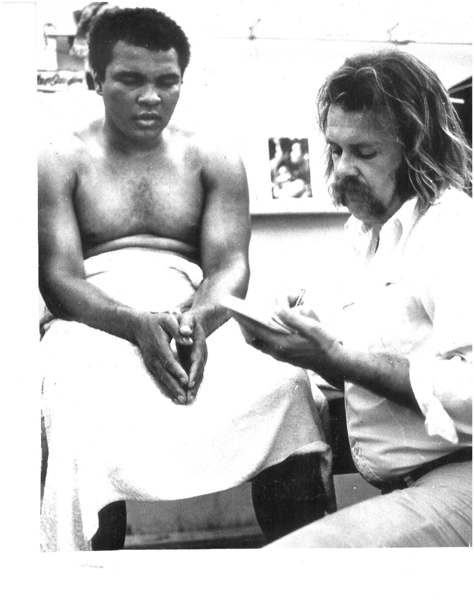 Tom Archdeacon interviews Muhammad Ali at the Fifth Street Gym in Miami.