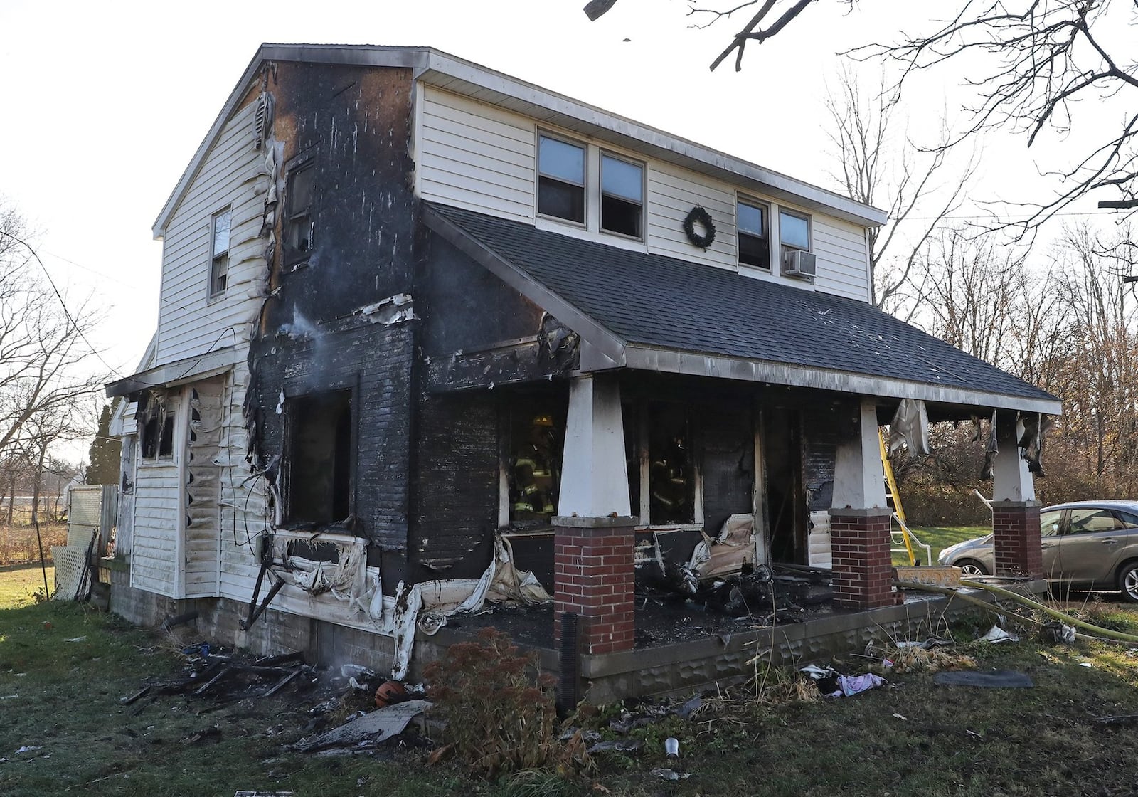 Five people were rescued from the second story of a burning house at 600 South Bird Road. An H.W. Mann & Sons garbage truck crew, on their morning rounds, pulled up next to the house and allowed two adults and a child to climb on the top of their truck. Members of the Clark County Sheriff’s Office and two janitors from Reid School across the street rescued a woman and baby from a ledge on the other side of the house. BILL LACKEY/STAFF