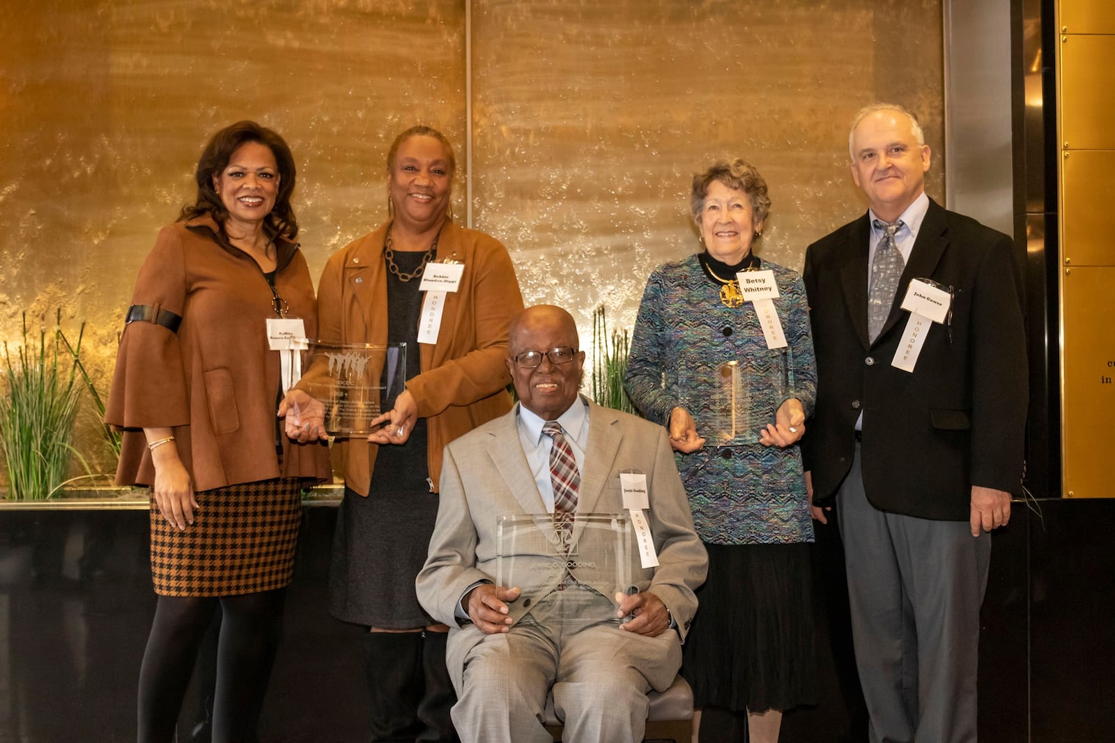 Left to right: Dayton Contemporary Dance Company CEO Ro Nita Hawes-Saunders, Dayton Contemporary Dance Company Chief Producing and Artistic Director Debbie Blunden-Diggs, Jesse Gooding Jr., Betsy Whitney and John Gowner at the 2019 Dayton Regional Walk of Fame induction at Sinclair Community College. DCDC was inducted and Hawes-Saunders and Blunden-Diggs accepted on the company's behalf. CONTRIBUTED