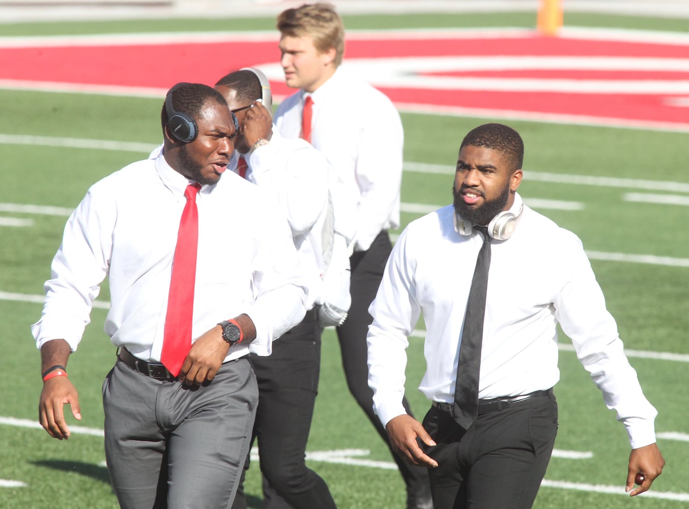 Photos: Urban Meyer jogs across field at Ohio Stadium