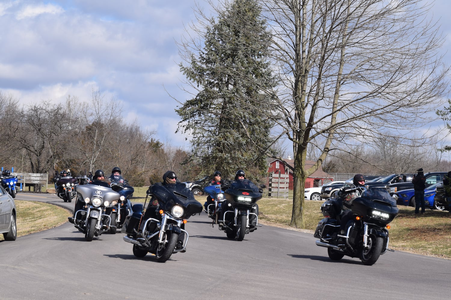 PHOTOS: Thousands of Outlaws attend motorcycle gang leaders funeral at Montgomery County Fairgrounds.