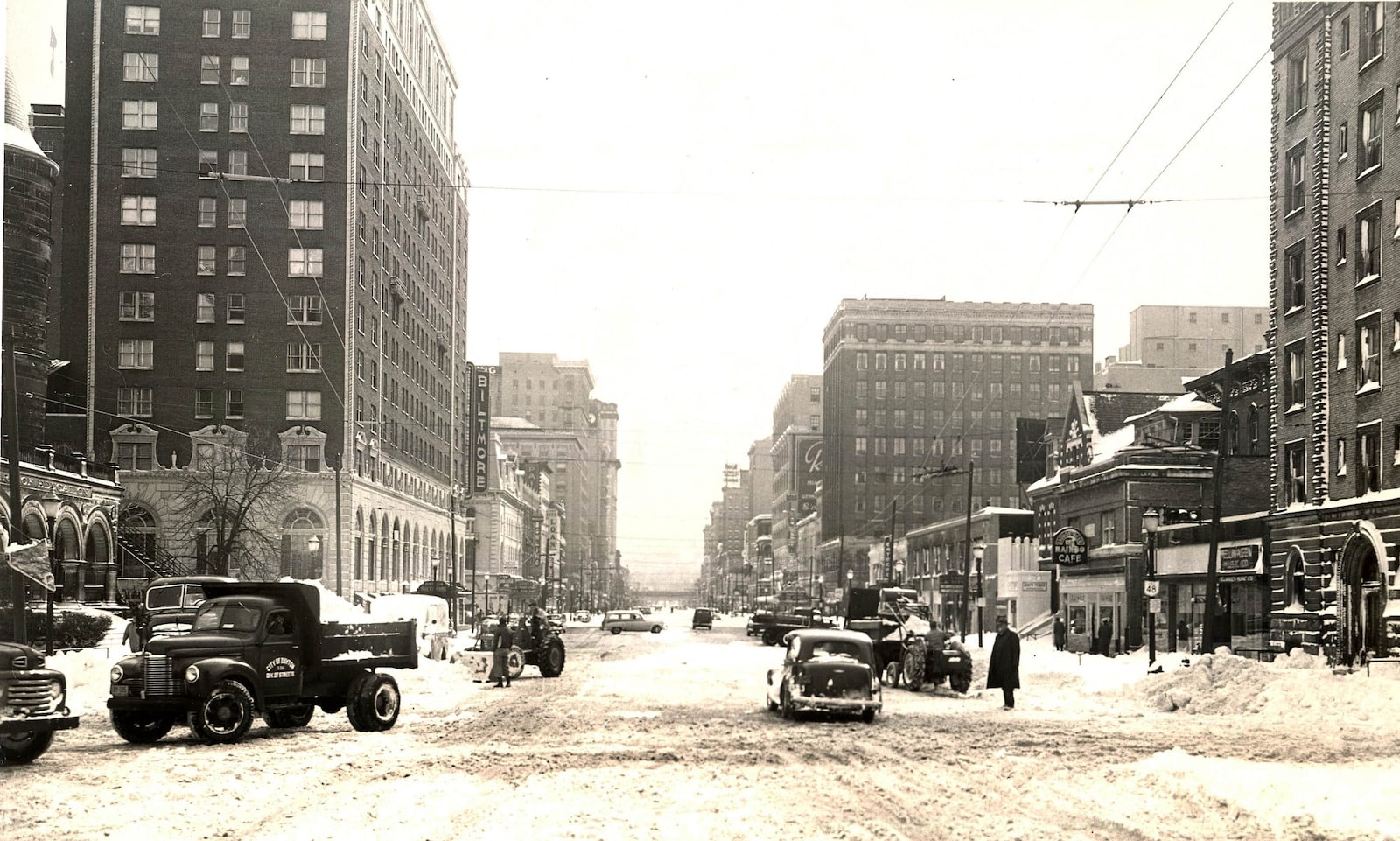 Vehicles and pedestrians attempt to navigate Main St. in downtown Dayton after nearly a foot of snow fell across the region after Thanksgiving Day in 1950. DAYTON DAILY NEWS/ WRIGHT STATE UNIVERSITY SPECIAL COLLECTIONS