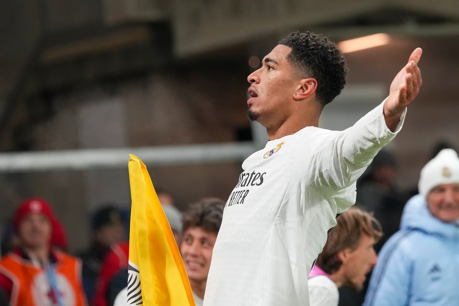 Real Madrid's Jude Bellingham celebrates after he scored his side's third goal during the Champions League opening phase soccer match between Atalanta and Real Madrid at the Bergamo's stadium, in Bergamo, Italy, Tuesday, Dec. 10, 2024. (AP Photo/Antonio Calanni)