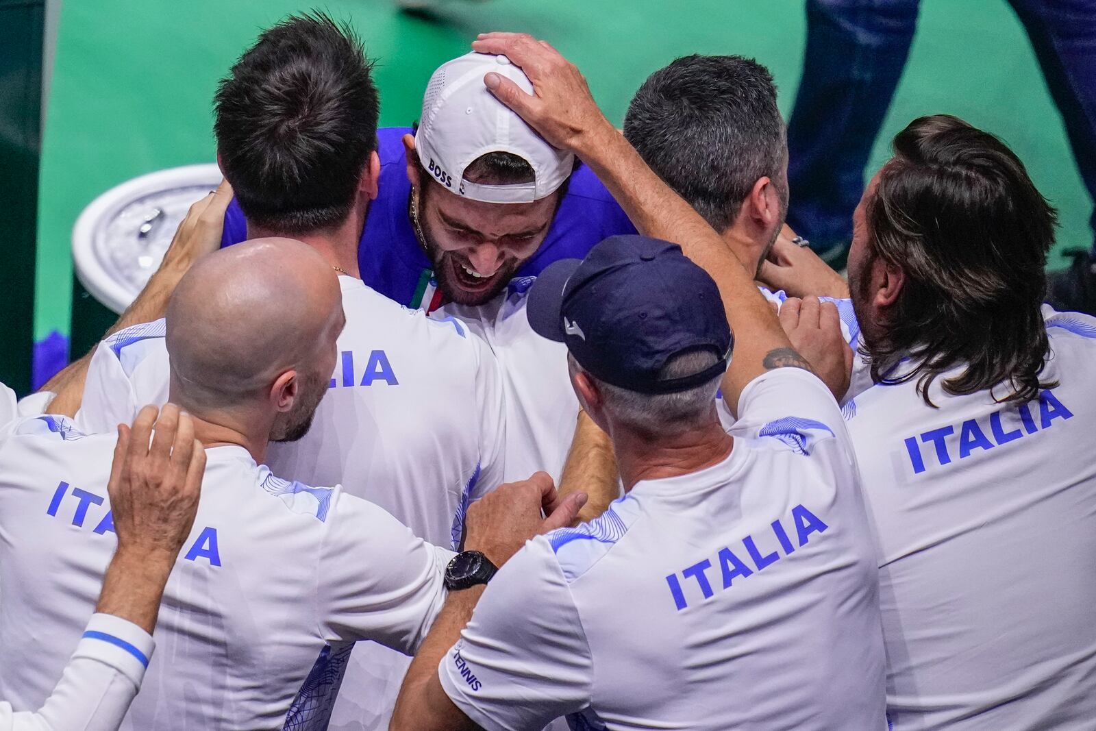 Italy's Matteo Berrettini celebrates after winning against Australia's Thanasi Kokkinakis during the Davis Cup semifinal at the Martin Carpena Sports Hall in Malaga, southern Spain, on Saturday, Nov. 23, 2024. (AP Photo/Manu Fernandez)