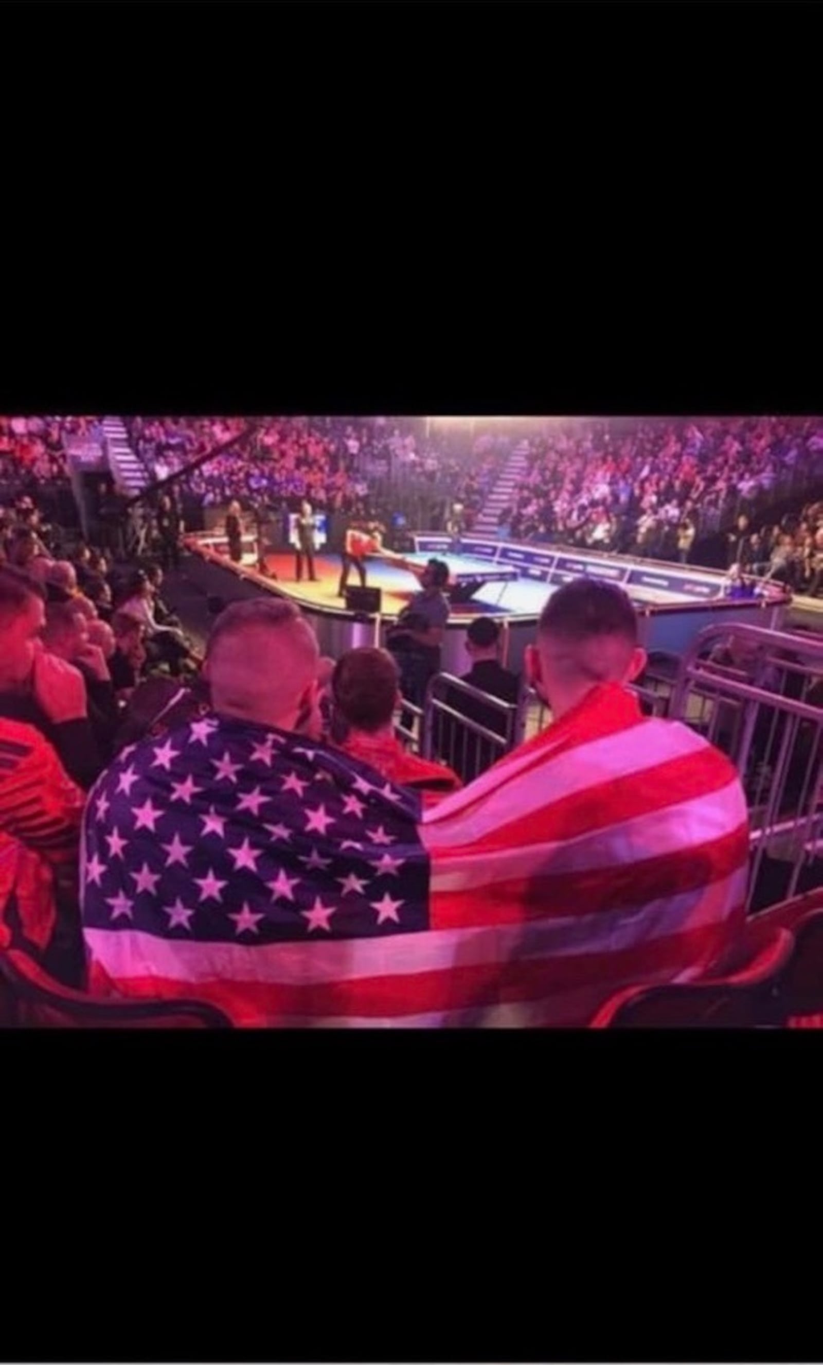 Wrapped in the American flag at the Mosconi Cup, Billy Thorpe (left) and his good friend Skyler Woodward, captain of Team USA. CONTRIBUTED