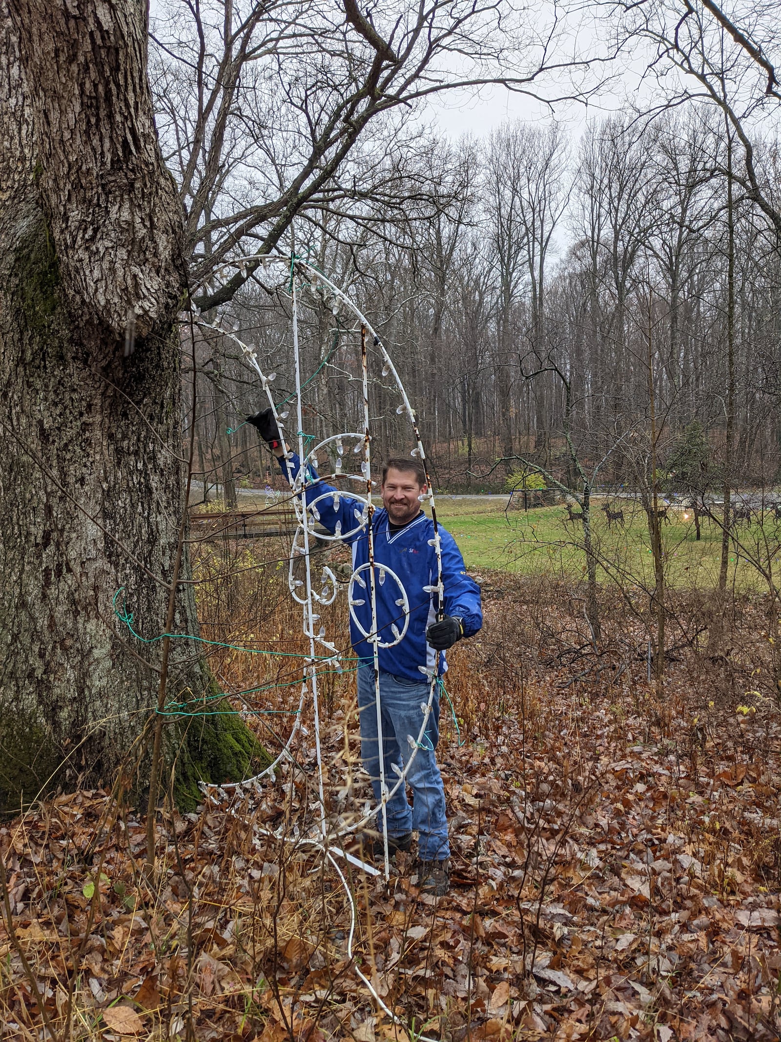 Lewis Willeford, the co-chair of Whispering Christmas in Eaton, setting up the holiday lights display.