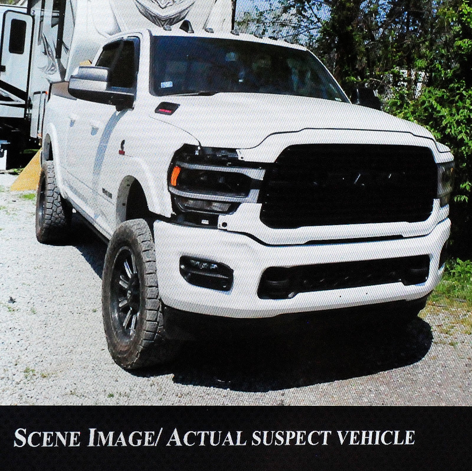 The suspect vehicle in a hit-and-run that killed a pedestrian Friday, April 21, 2023, on Interstate 75 South in Moraine was a white 2021 Dodge Ram 2500 pickup truck tracked to a campground in Oldham County, Kentucky. MARSHALL GORBY\STAFF