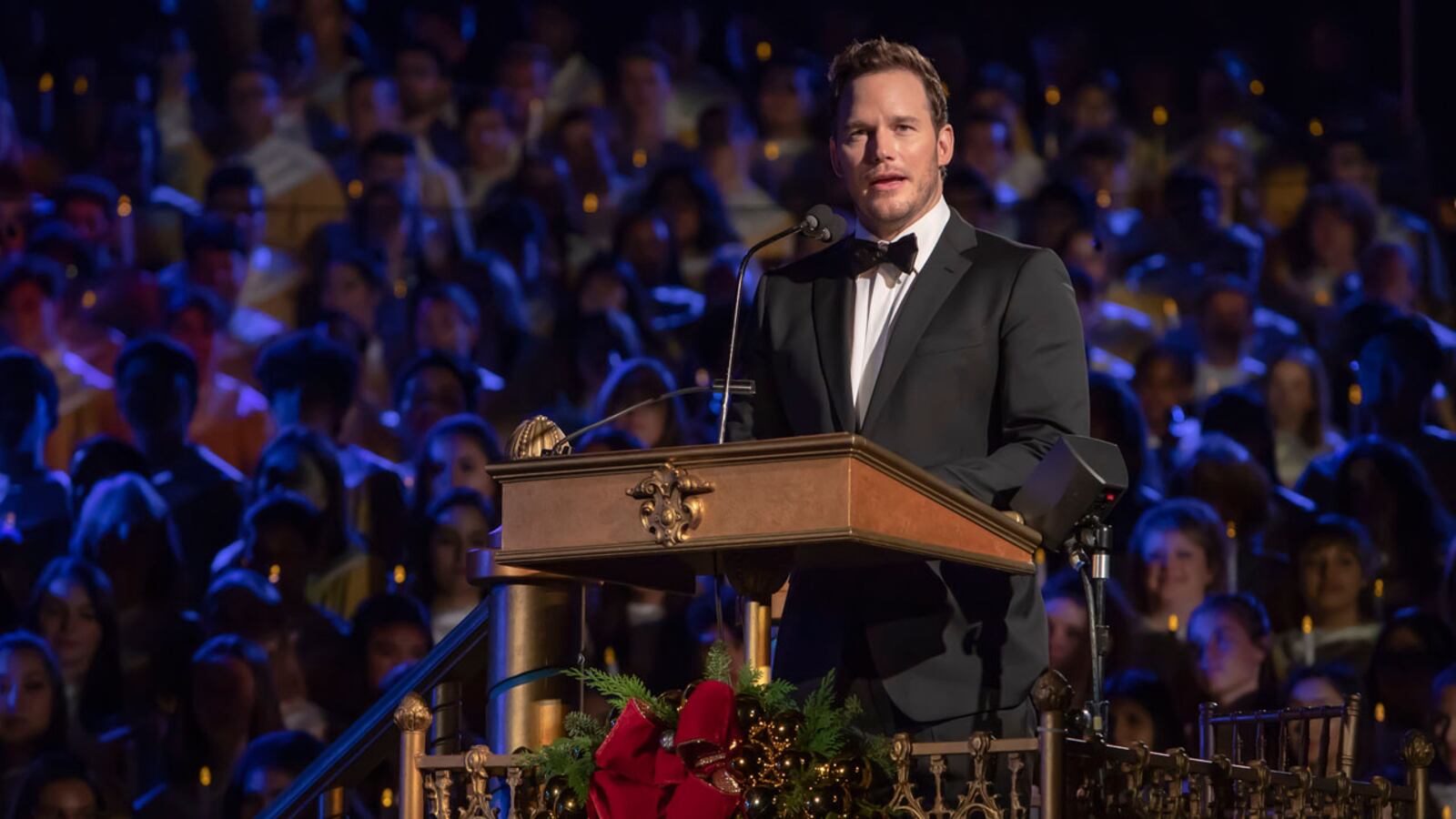 In this handout photo provided by Disney Resorts, Chris Pratt narrates the story of Christmas during Disneyland's annual Candlelight Processional on December 01, 2018 at Disneyland in Anaheim, California. The tradition of the Candlelight Processional began in 1958 with Walt Disney. Pratt officially acknowledged his relationship with Katherine Schwarzenegger on social media.