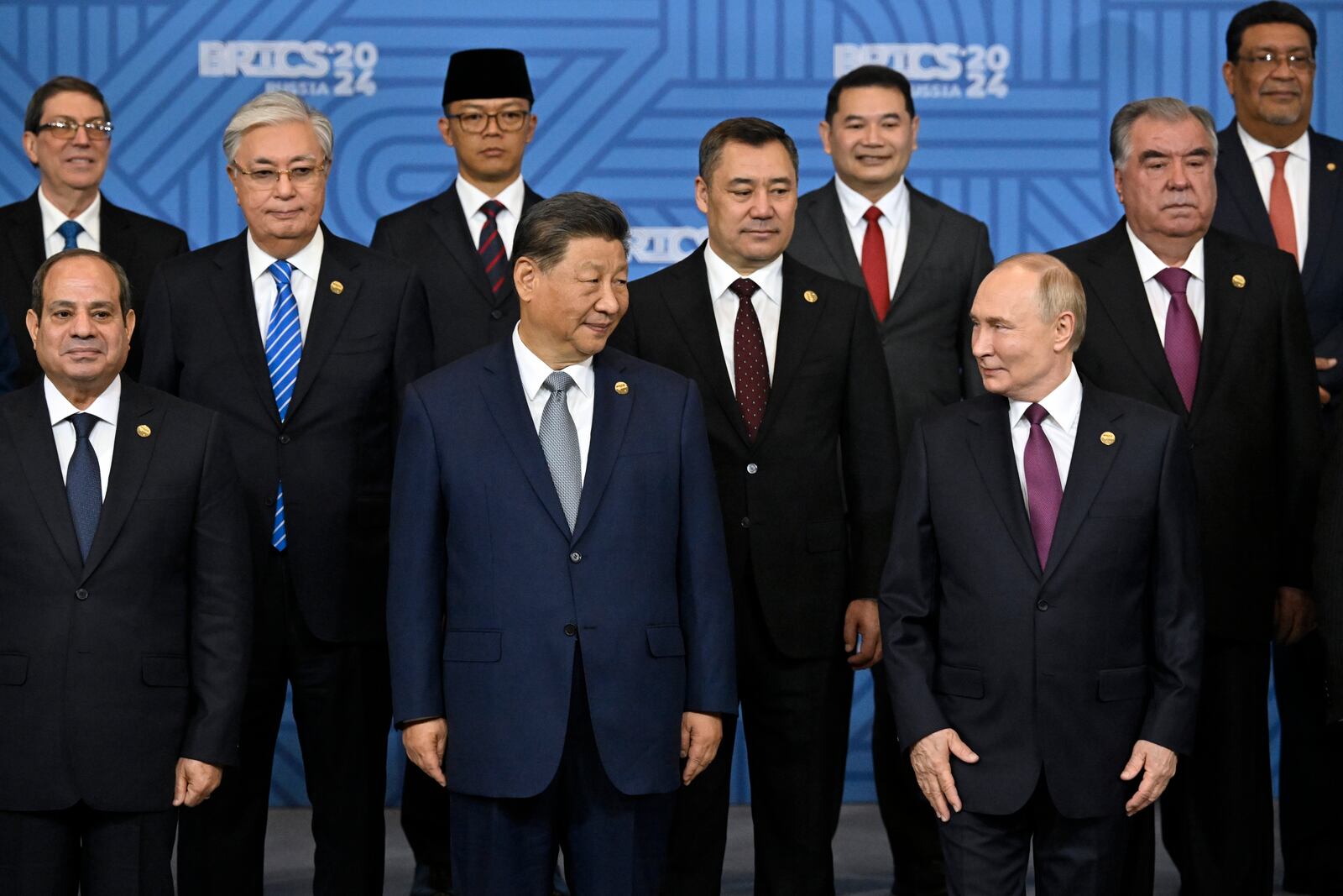 Russian President Vladimir Putin, right, and other participants pose for a family photo prior to Outreach/BRICS Plus format session at BRICS Summit in Kazan, Russia, Thursday, Oct. 24, 2024. (Alexander Nemenov, Pool Photo via AP)