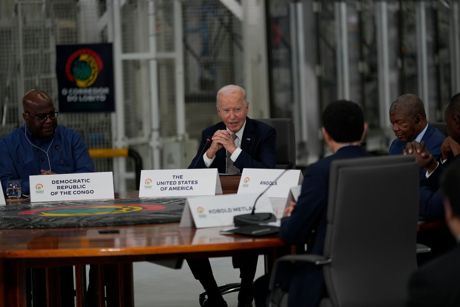 President Joe Biden, center, participates in the Lobito Corridor Trans-Africa Summit at the Carrinho food processing factory near Lobito, Angola, on Wednesday, Dec. 4, 2024. (AP Photo/Ben Curtis)